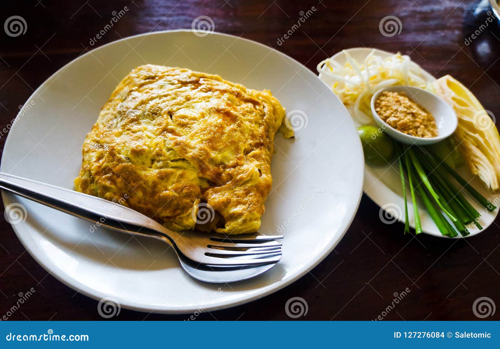 Egg Wrapped Pad Thai on a Plate in Restaurant Stock Photo Image of