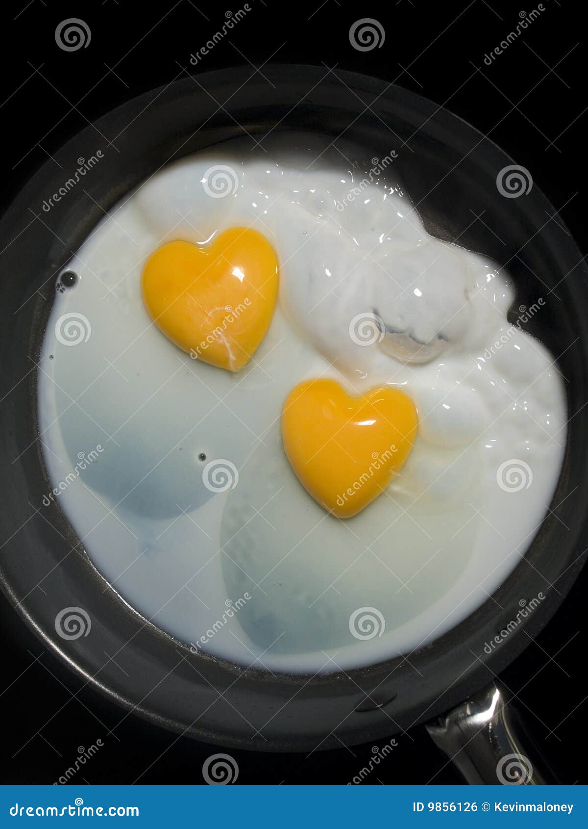 Egg yolk heart shape stock photo. Image of cooking, healthy 9856126