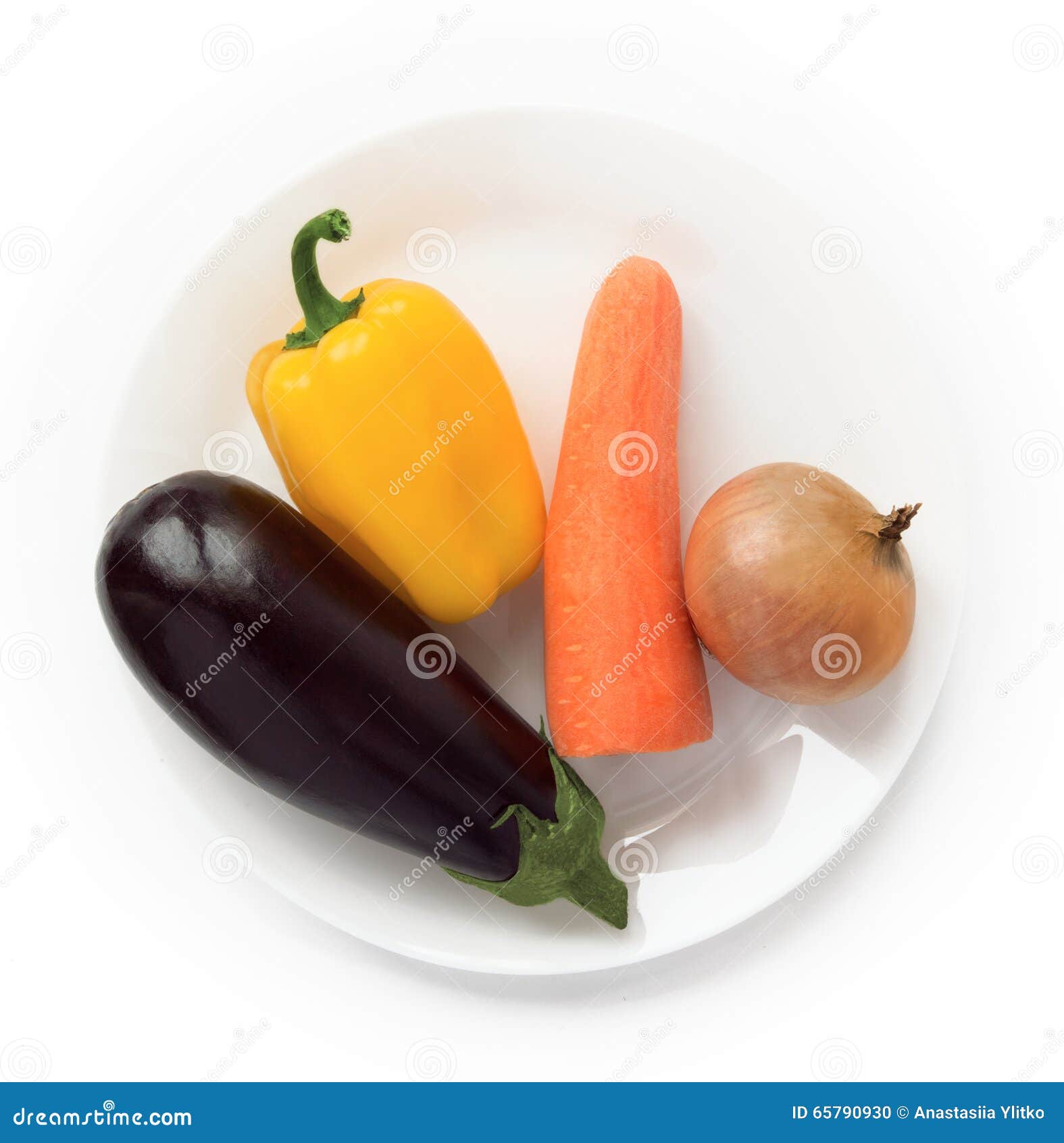 Eggplant, Bell Pepper, Carrot and Onion on the Plate Stock Photo