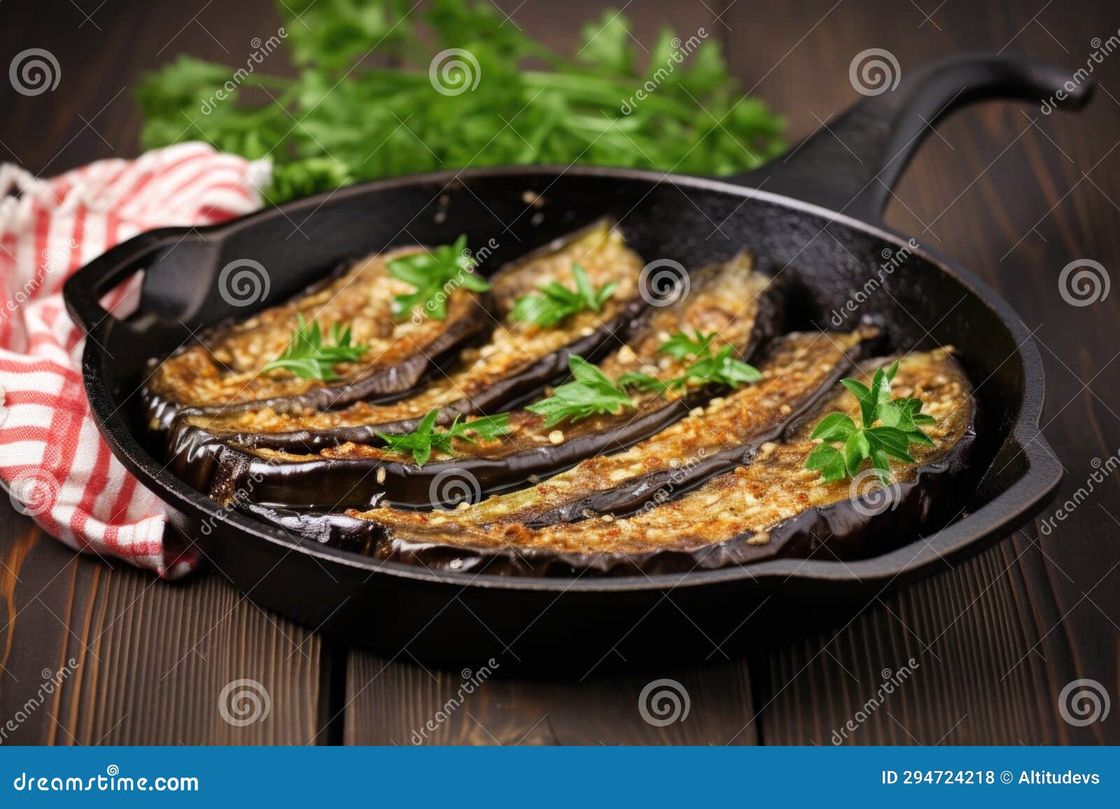 Eggplant Half with a Caramelized Top in a Castiron Pan Stock Photo