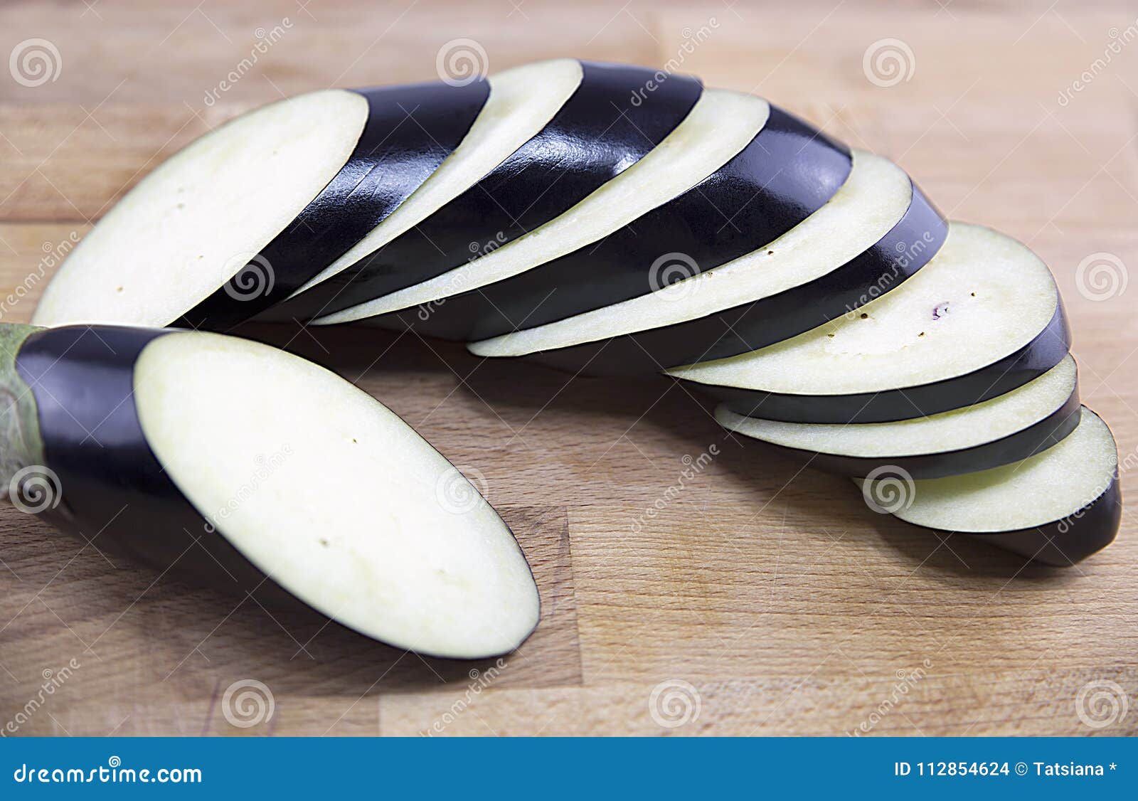 Eggplant, a Nightshade, a Vegetable Cut into Slices Closeup, Macro