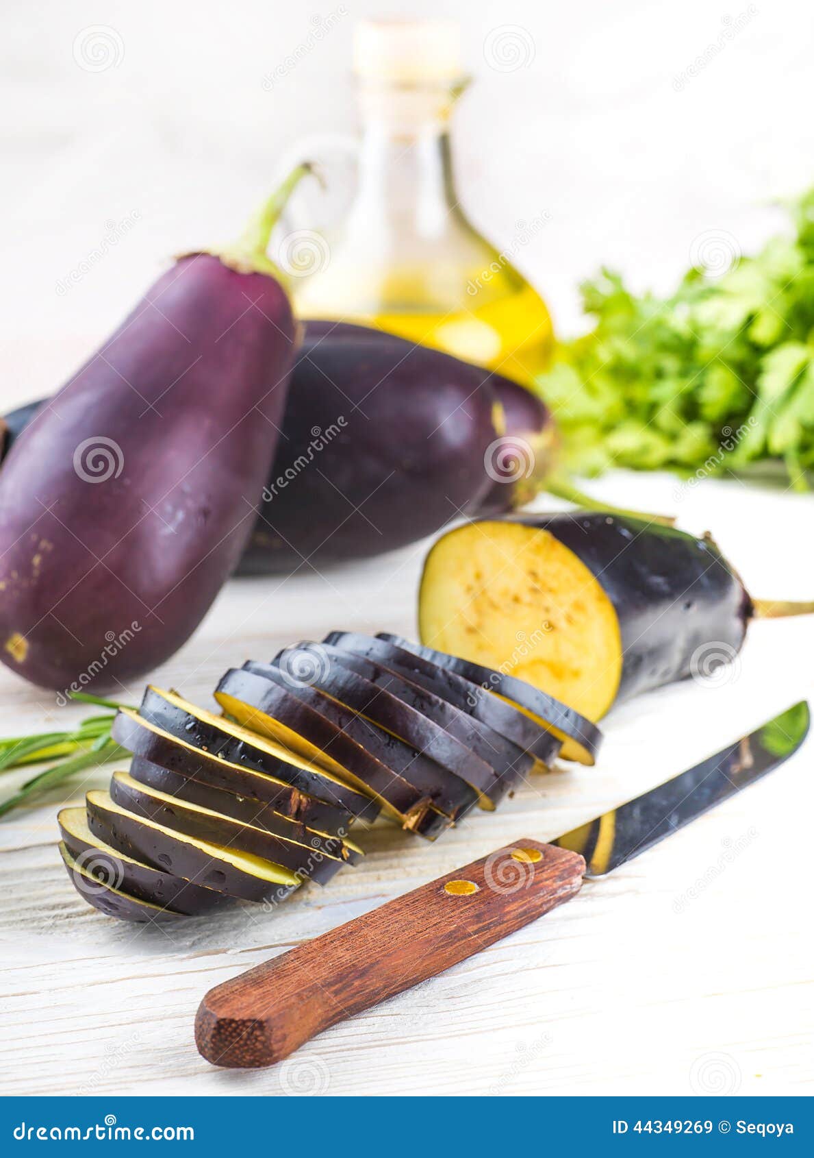 Eggplant and olive oil stock image. Image of board, olives 44349269