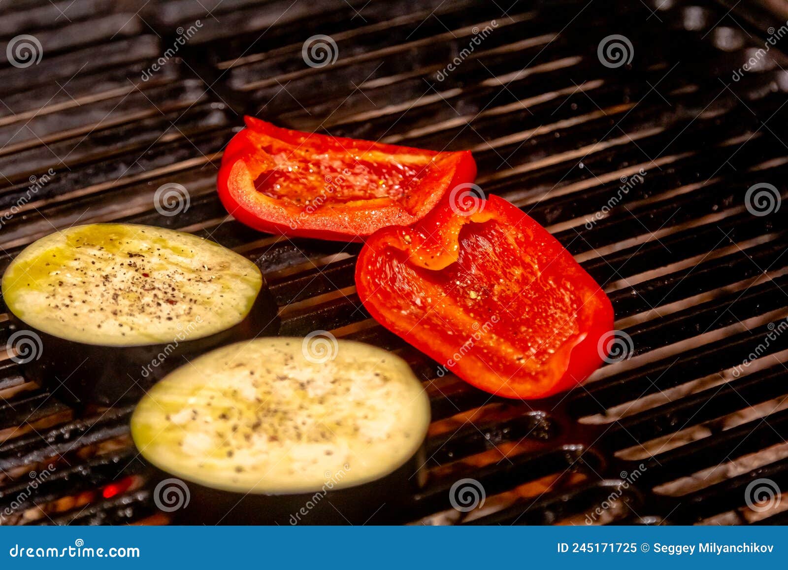 Eggplant and Sweet Pepper are Fried on a Charcoal Grill Stock Image