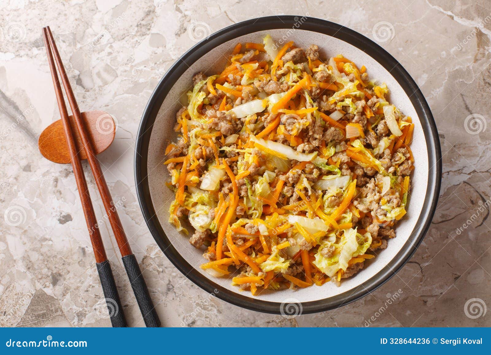 eggroll in a bowl sauteed ground meat with vegetables in flavor packed sauce closeup. horizontal top view