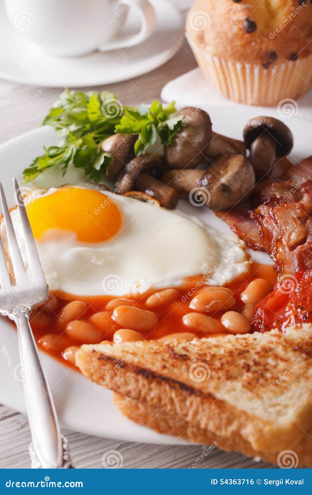 Eggs with Bacon and Vegetables Closeup on a Plate. Vertical Stock