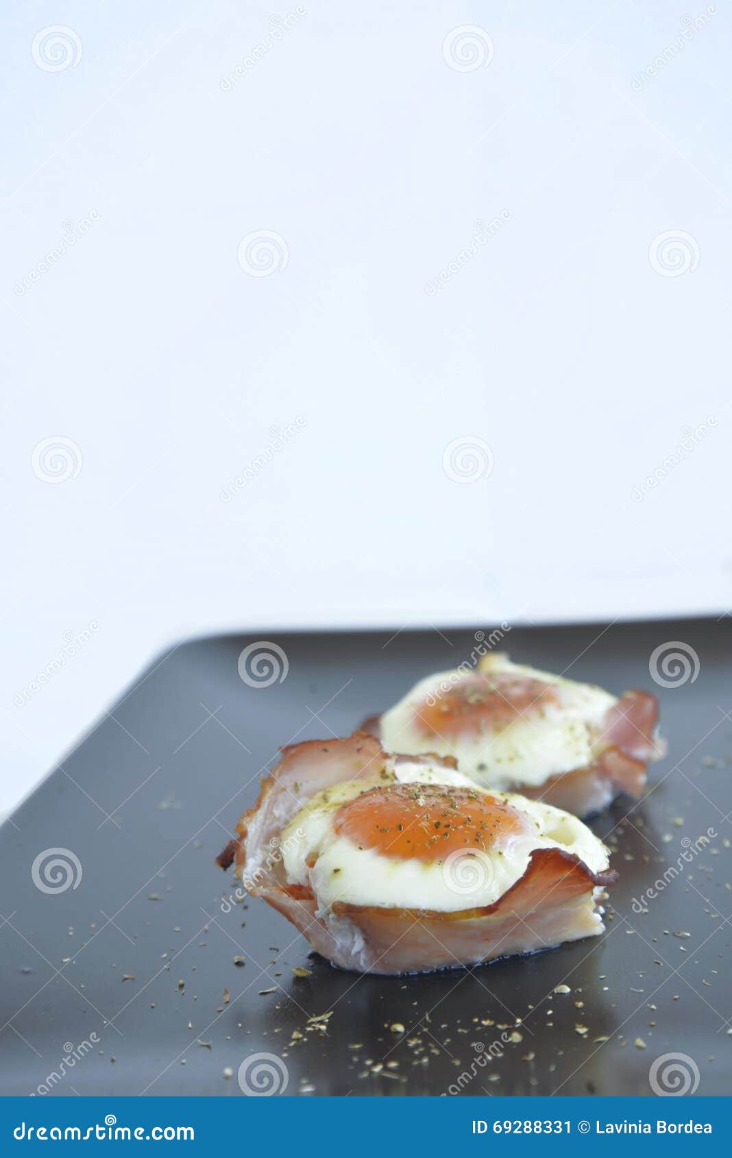 Eggs in ham cups stock image. Image of lunch, restaurant 69288331