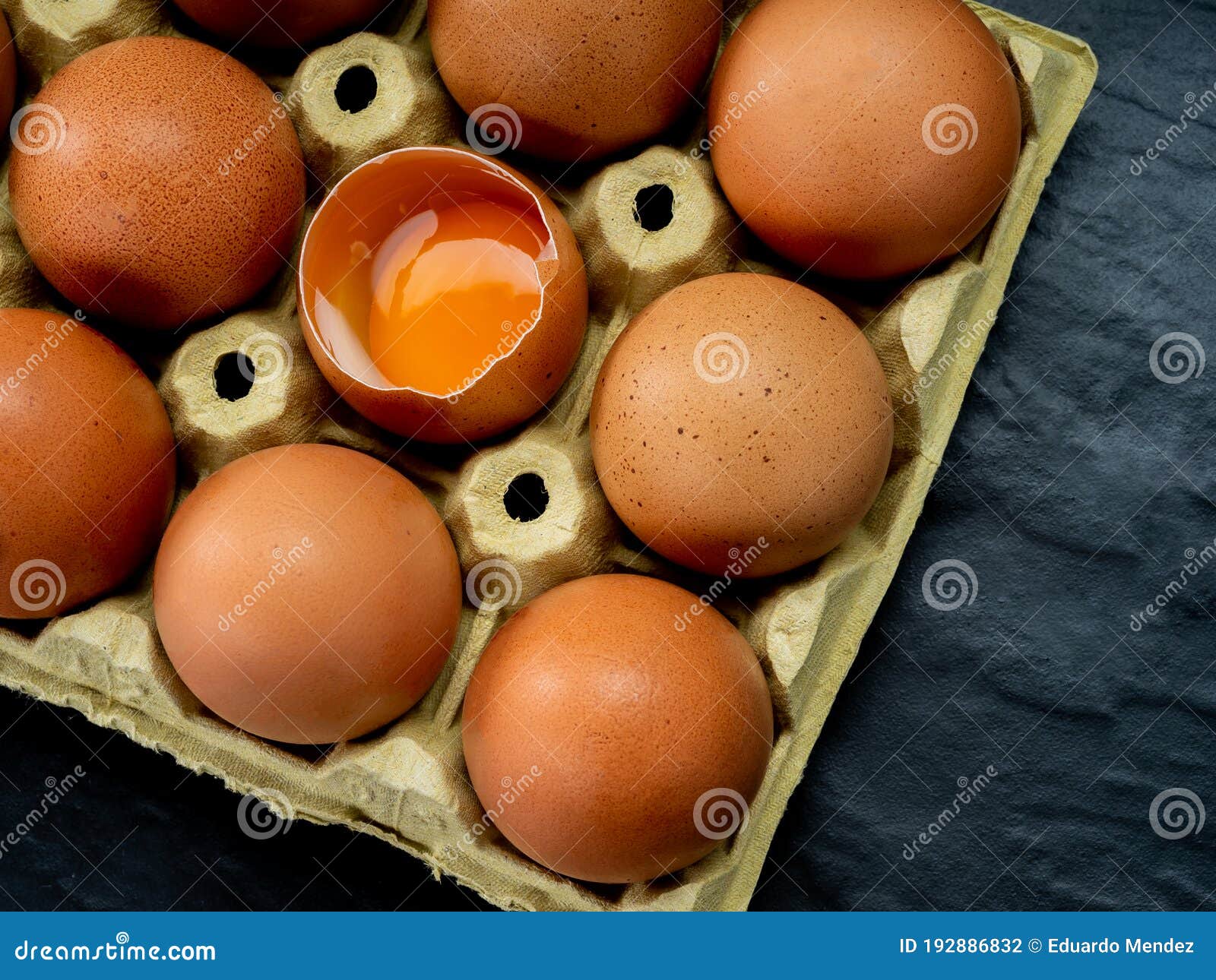 Eggs in a Yellow Cardboard Egg Cup Stock Photo Image of fragile