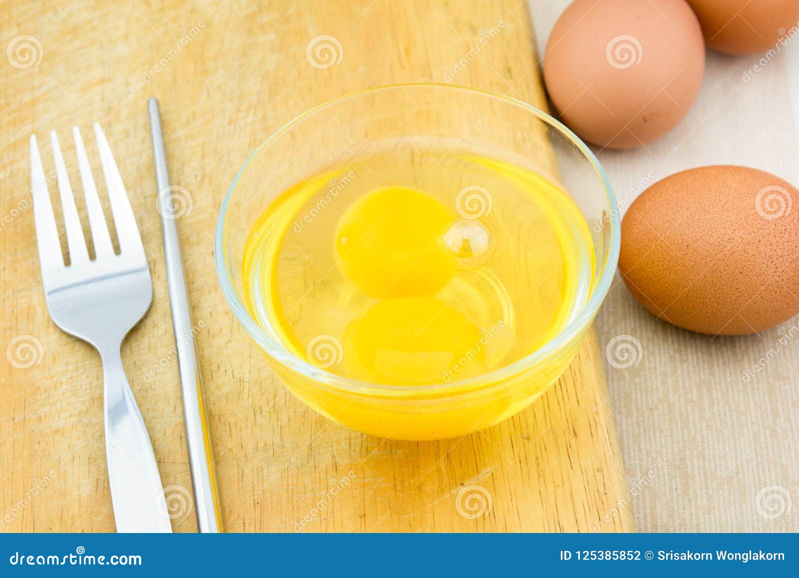 Eggs Yolk on the Bowl Ready To Cook. Stock Photo Image of golden