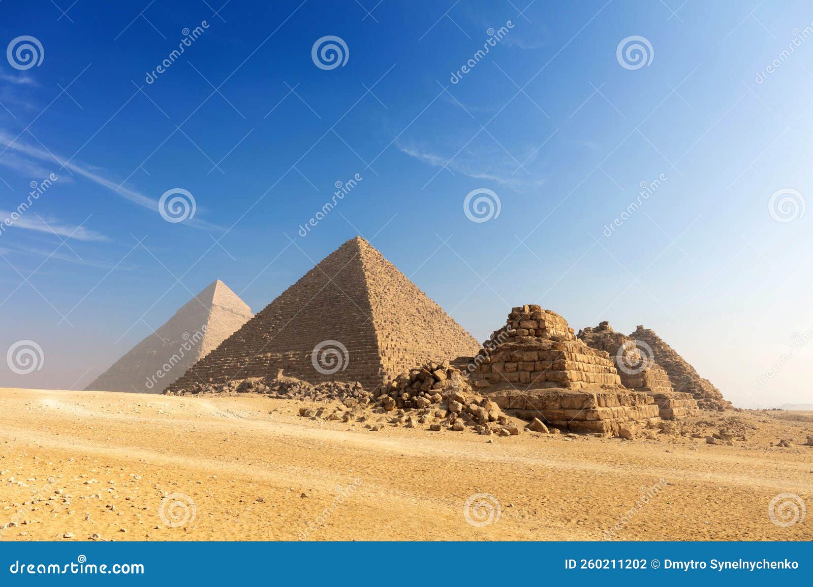 egypt. cairo - giza. general view of pyramids from the giza plateau three pyramids known as queens pyramids on front