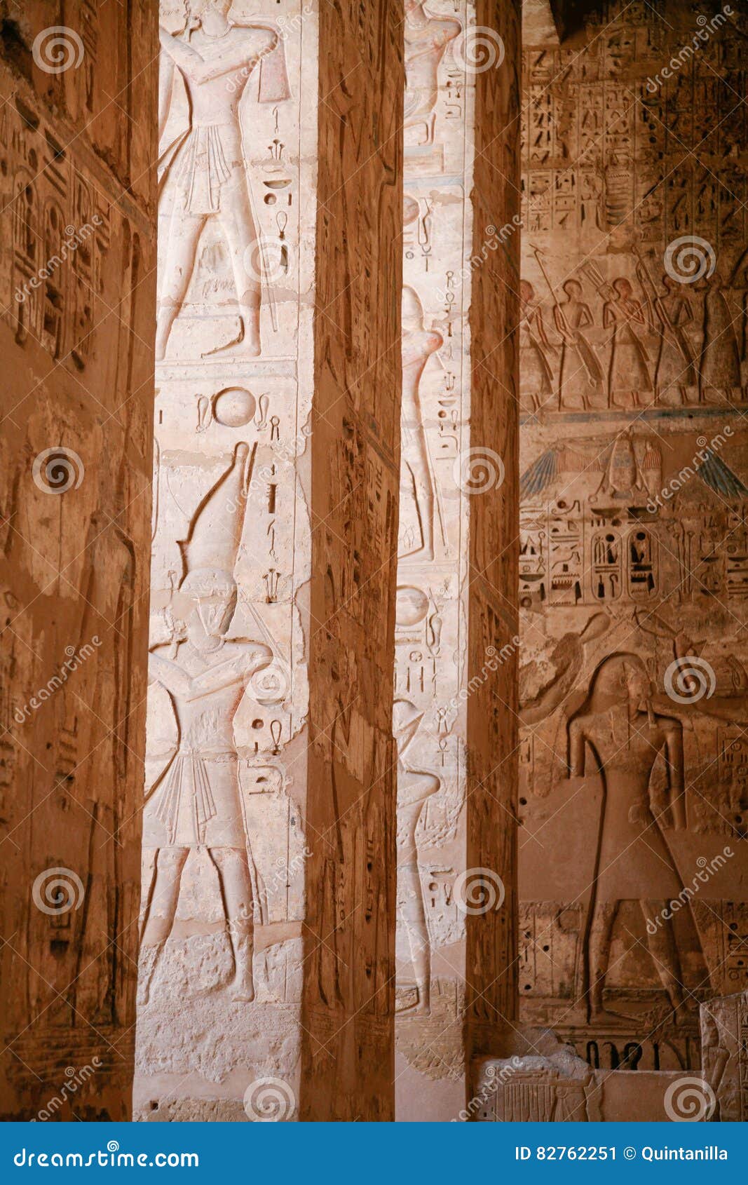 egyptian figures in columns