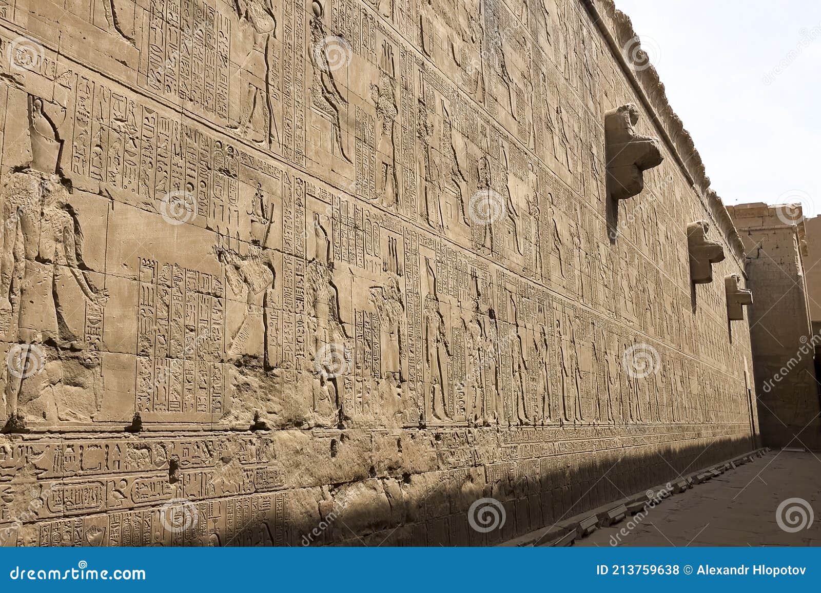 egyptian hieroglyphs and drawings on the walls and columns. egyptian language, the life of ancient gods and people in