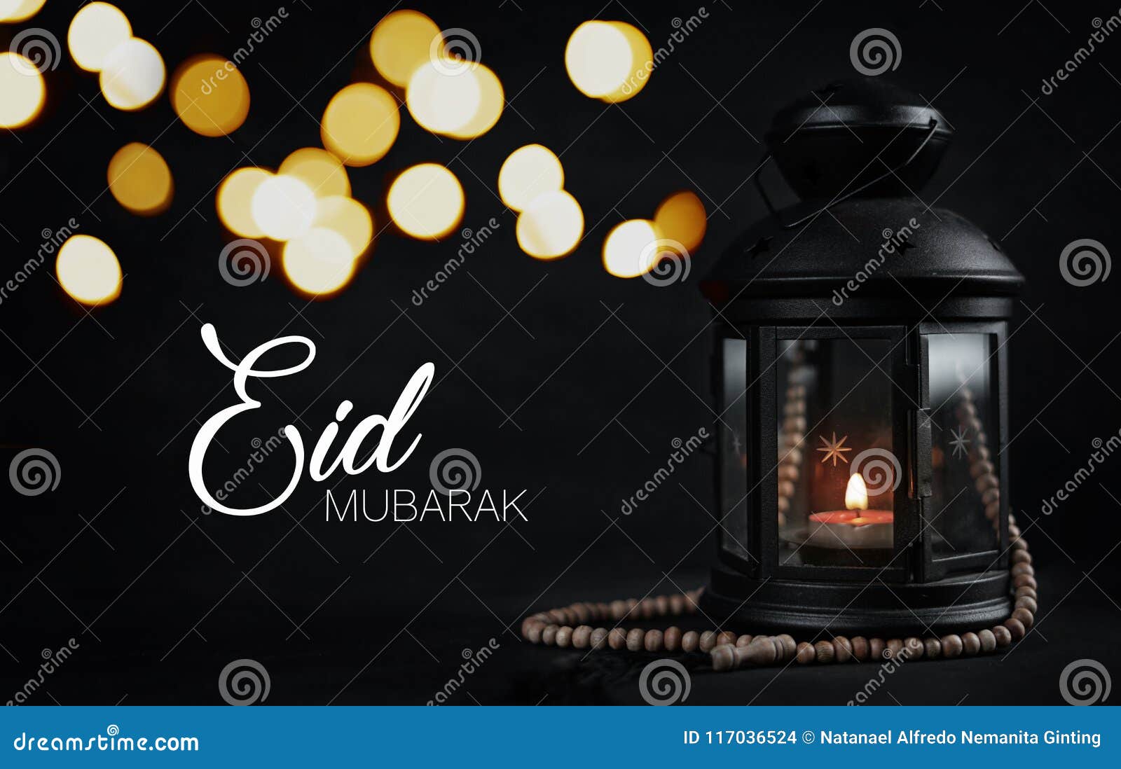 eid mubarak greeting typography beautiful bokeh. ramadan candle