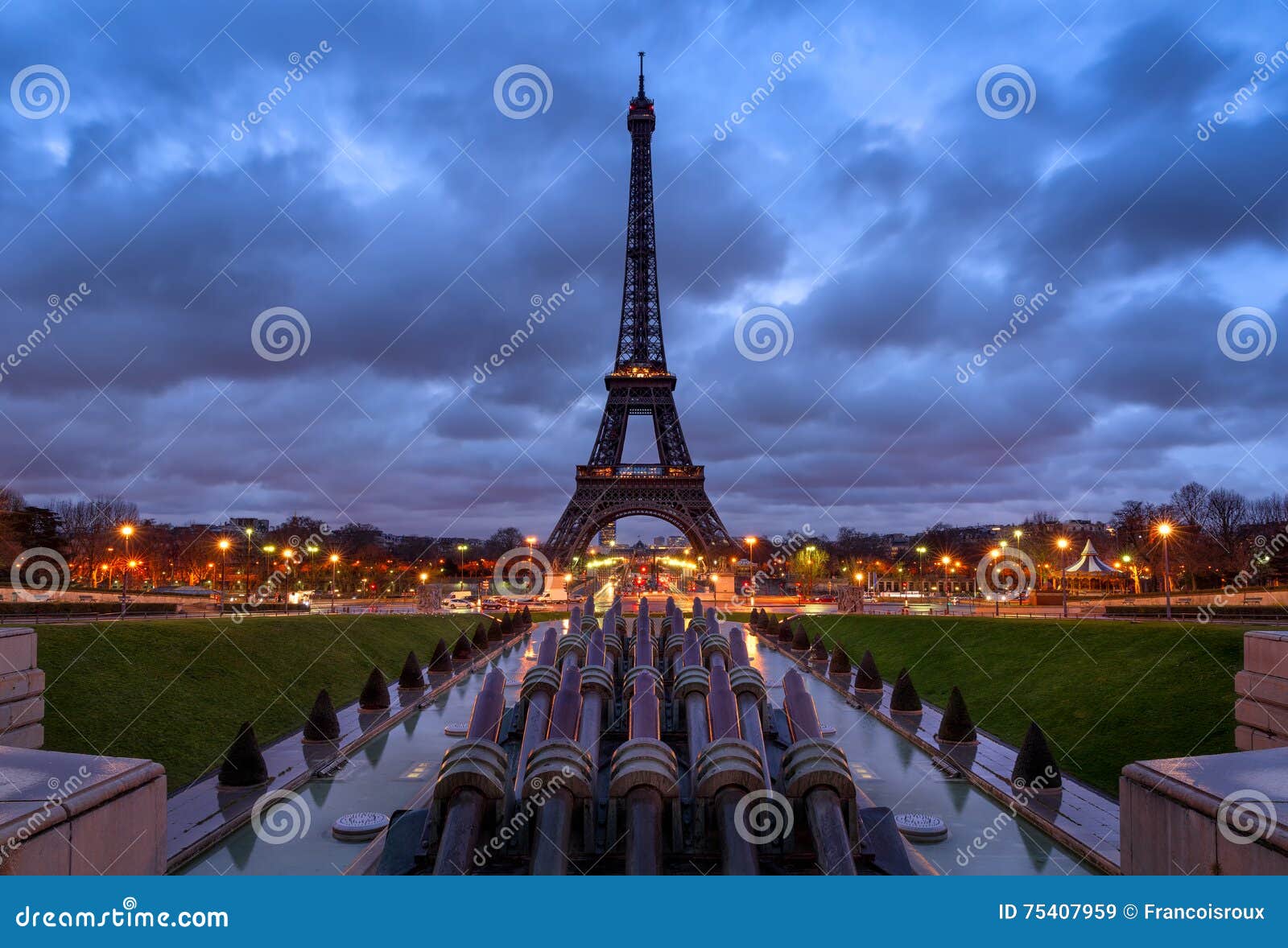 eiffel tower at sunrise with clouds from trocadero, paris, france