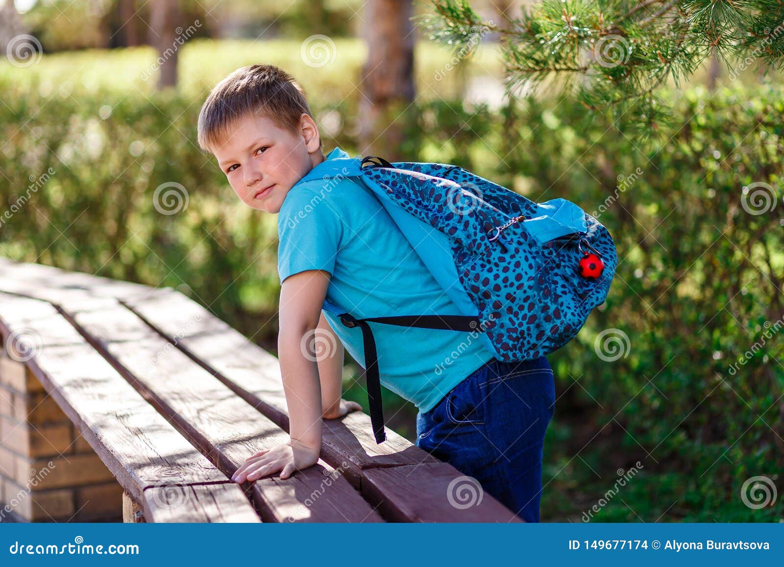 Eightyearold Boy with a Backpack Stock Photo Image of smile