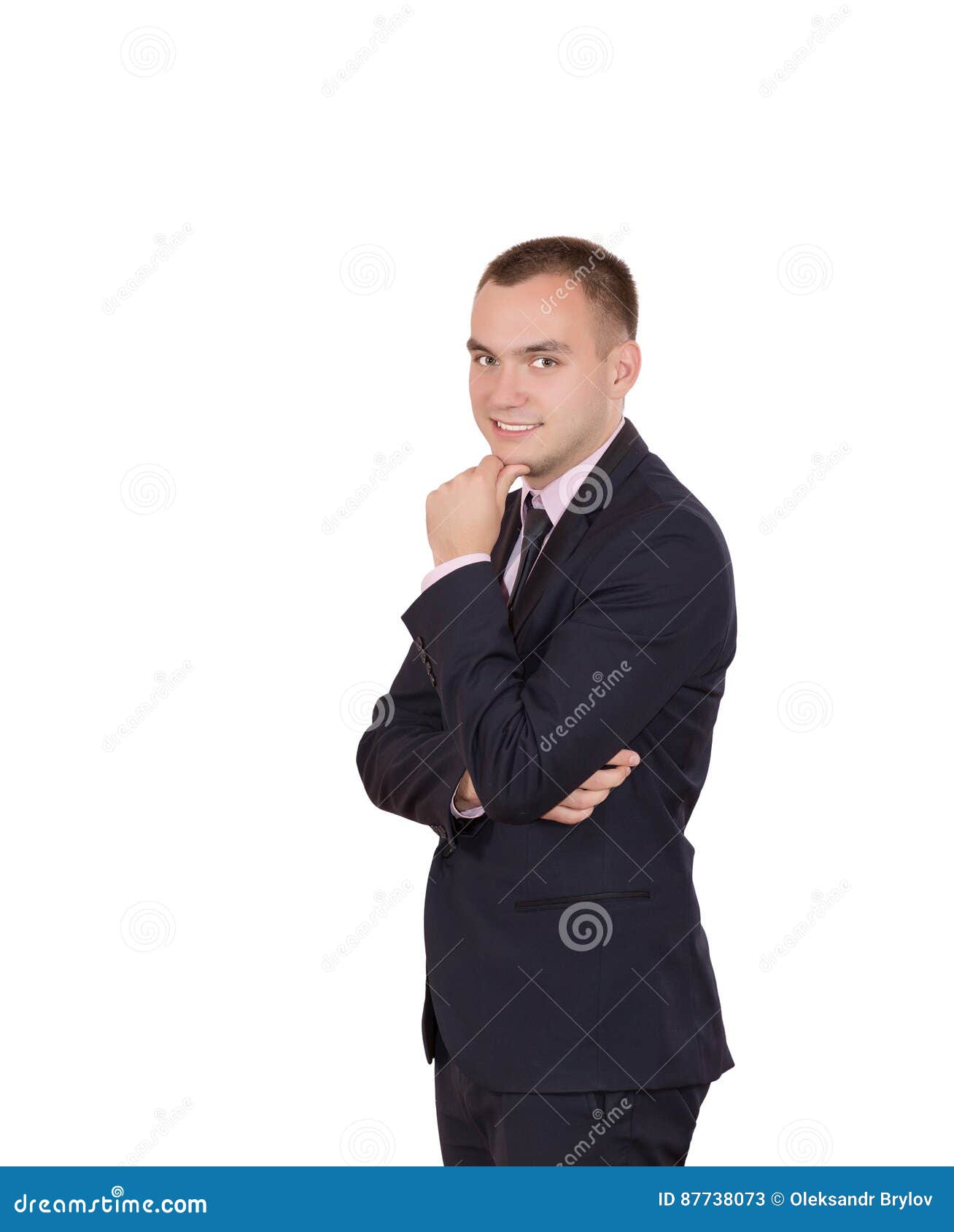 Ein Mann in der Geschäfts-Art-Kleidung auf weißem Hintergrund. Ein Mann in der dunkelblauen Jacke der Geschäfts-Art-Kleidungs und Bindung auf dem Bleiben auf weißer Hintergrund-denkendem Gesichts-Ausdruck