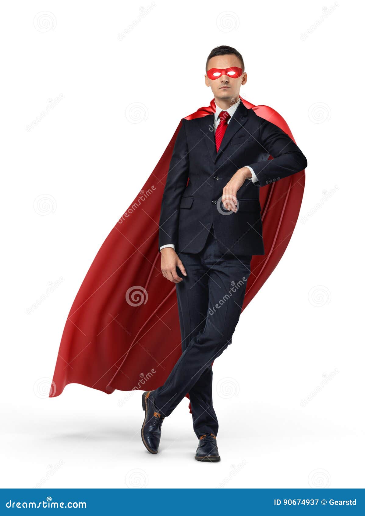 Ein Superheld In Einem Anzug Und In Einem Roten Kap Die Auf Einem Unsichtbaren Gegenstand Auf Weissem Hintergrund Sich Lehnen Stockbild Bild Von Weissem Anzug
