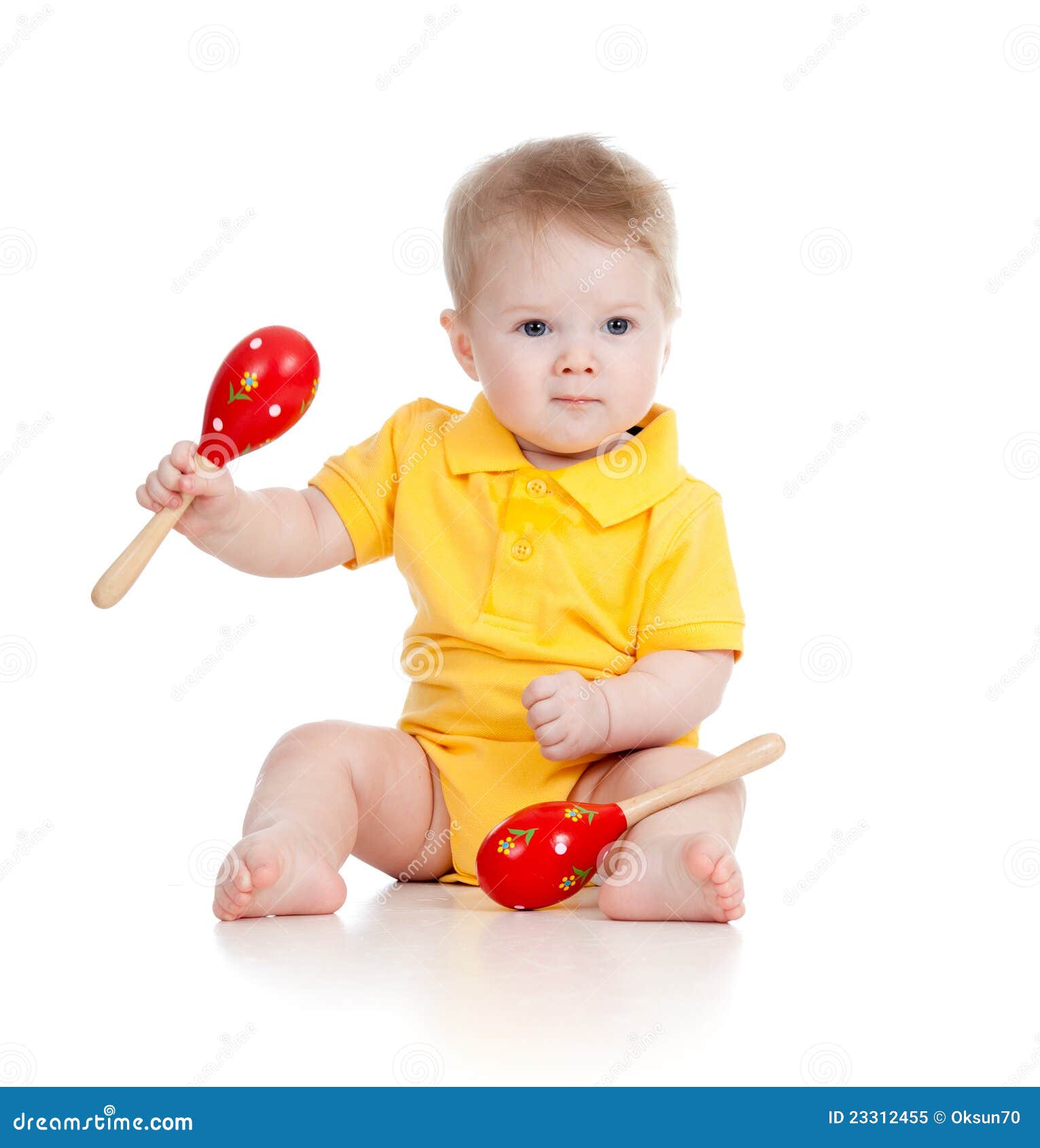 El Bebé Con Musical Juega Maracas Imagen de archivo - Imagen de sentada,  feliz: 23312455