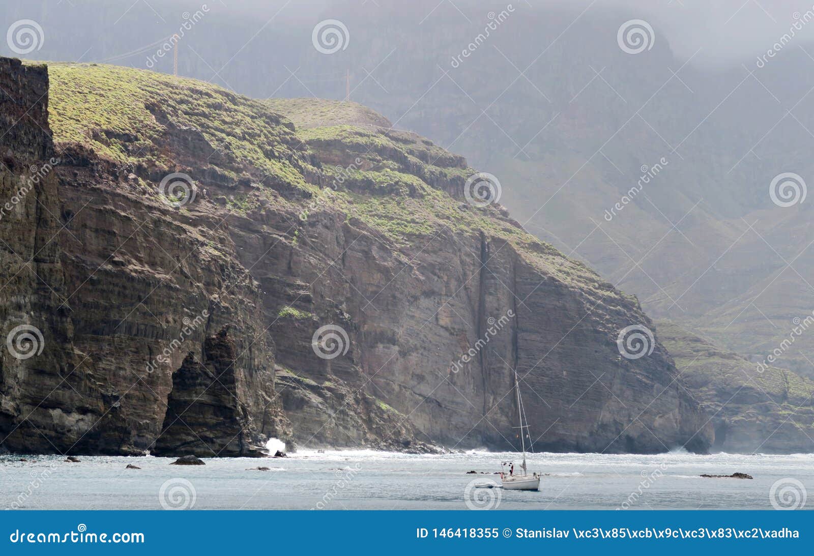 el dedo de dios - rock near the coast bay near the town agaete in the island of gran canaria