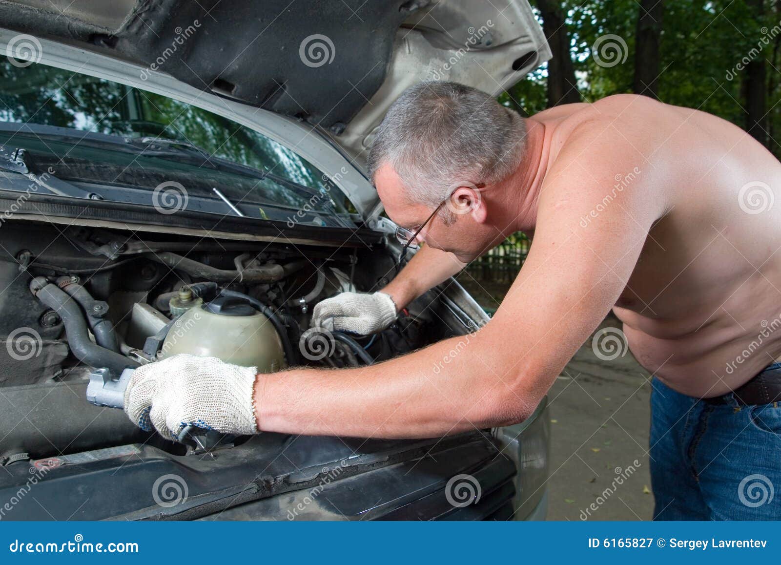 Fixes his car