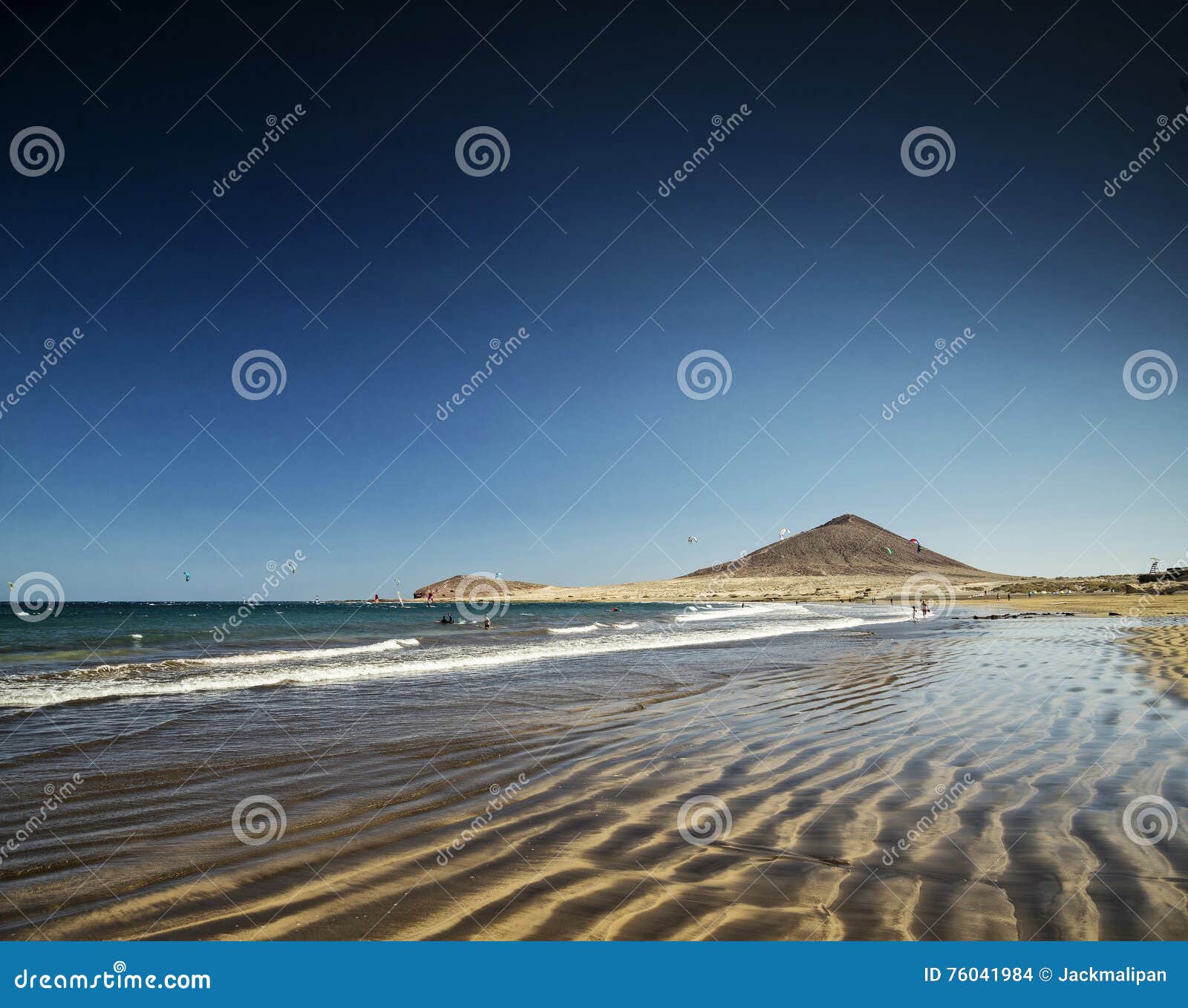 el medano beach and montana roja landscape in tenerife spain