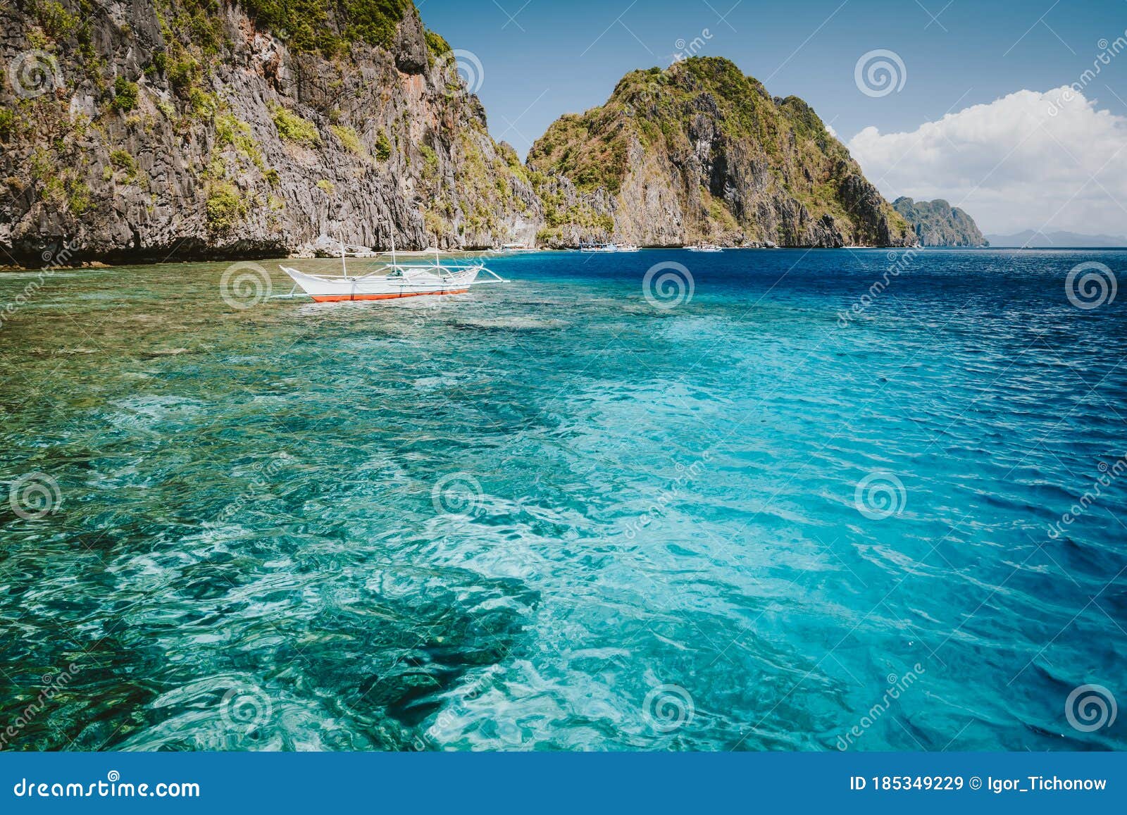 Nido, Palawan, Philippines. Banca Boat in Crystal Clear Ocean Water Near Matinloc Island, Highlights of Hopping Trip on C Stock Image - Image of hopping, holiday: 185349229