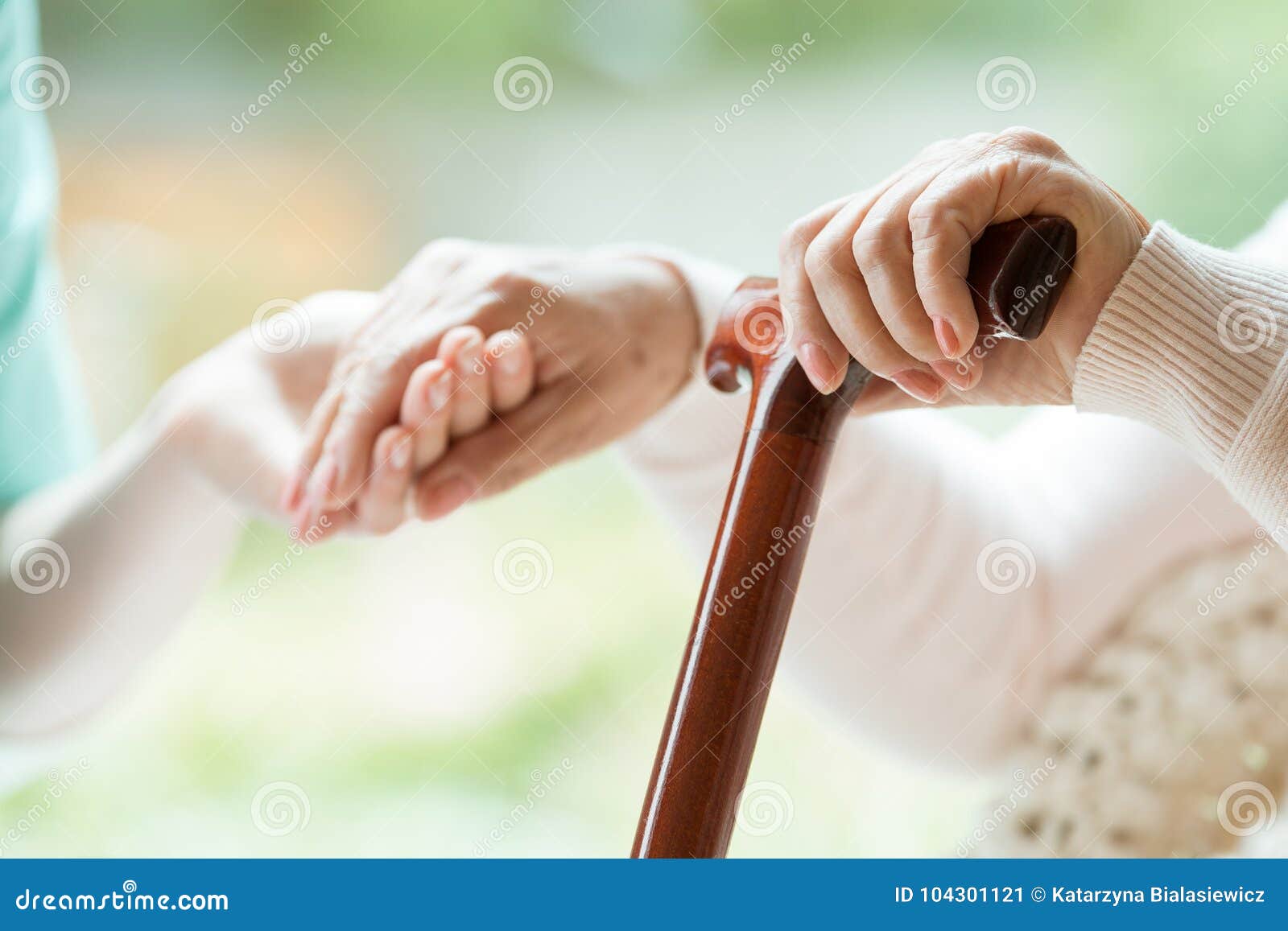 elder person using walking cane