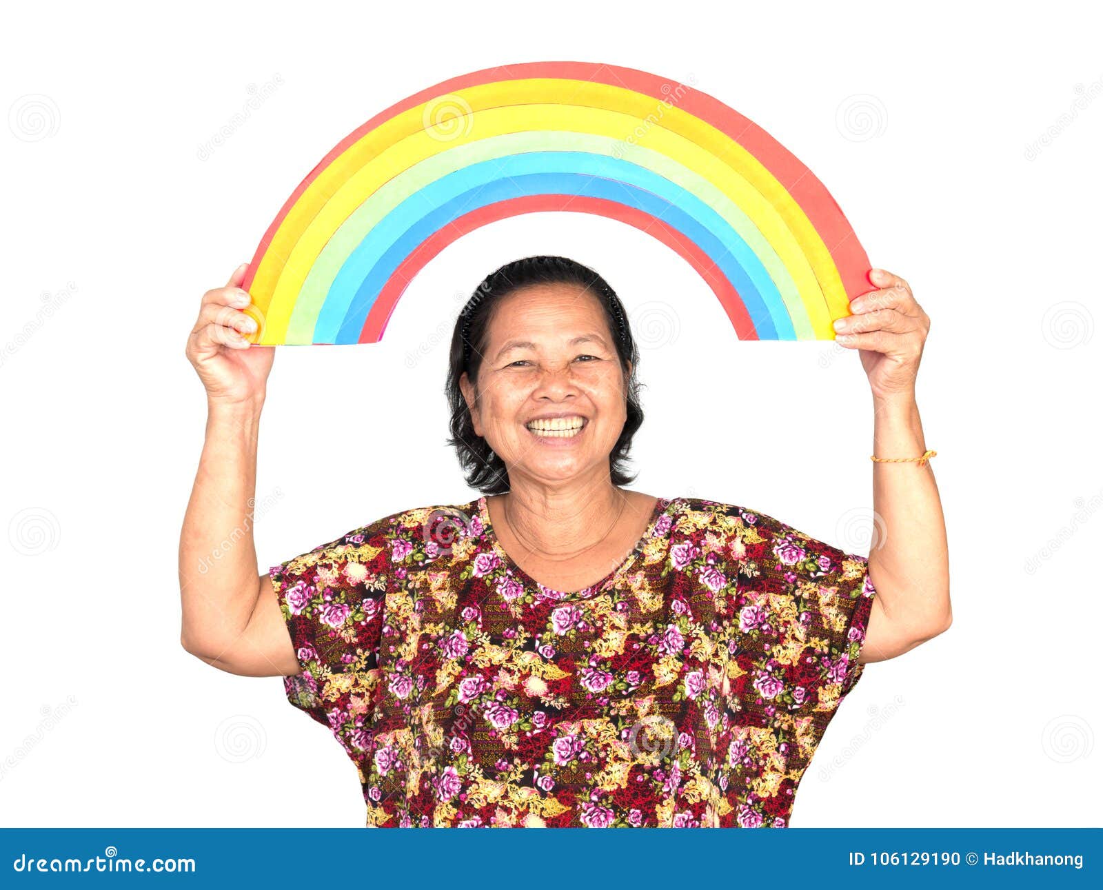 The Elderly Asian Woman Smiling while Holding Colorful Rainbow O