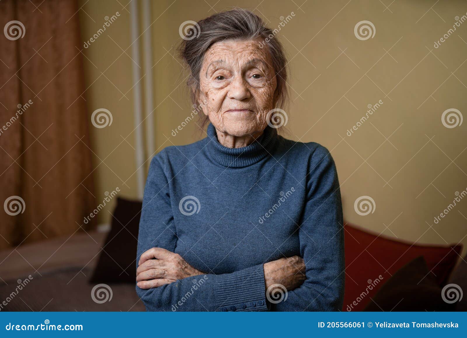 Elderly Caucasian Senior Grandmother Ninety Years Old Looks Attentively And Smiles Feels Happy