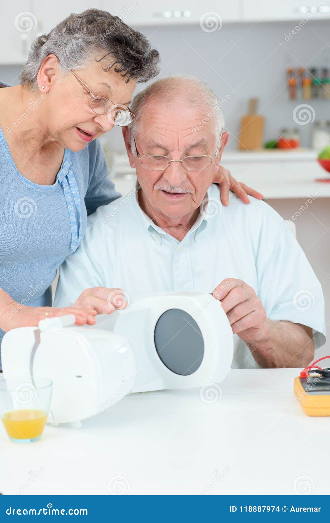 Elderly Couple with Coffee Maker Stock Photo Image of husband, couple
