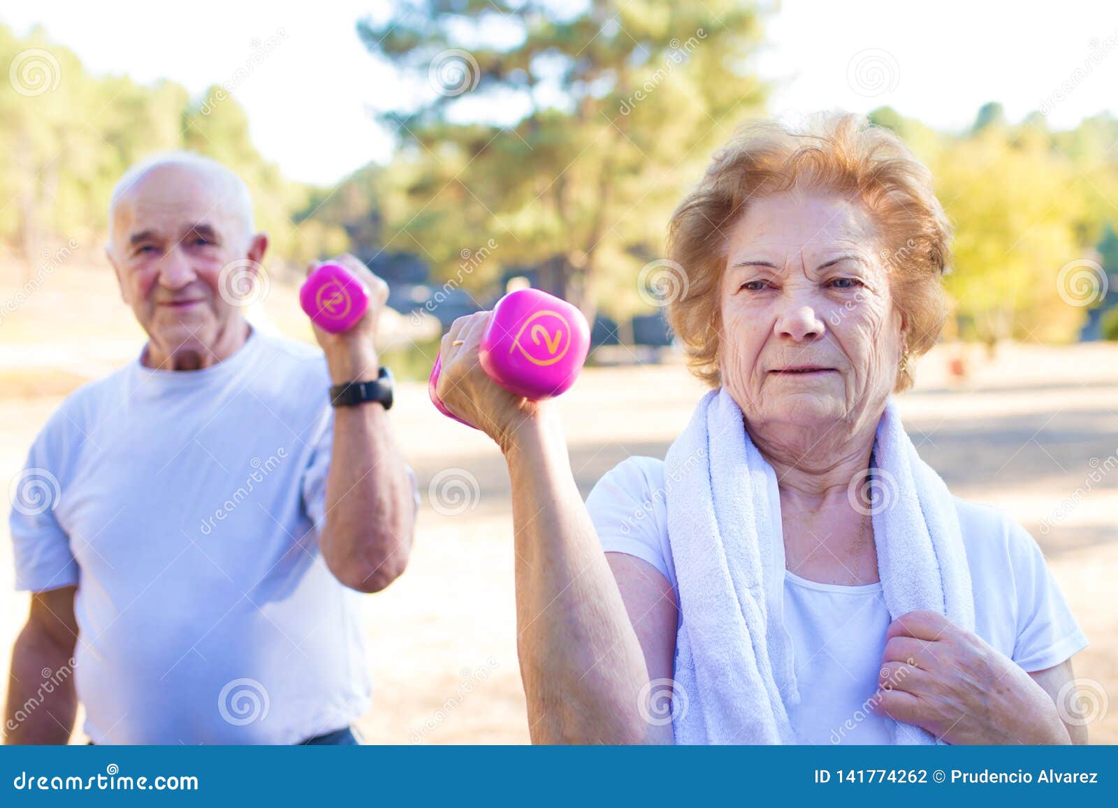 Elderly Couple Lifting Weights Stock Photo Image of training, woman