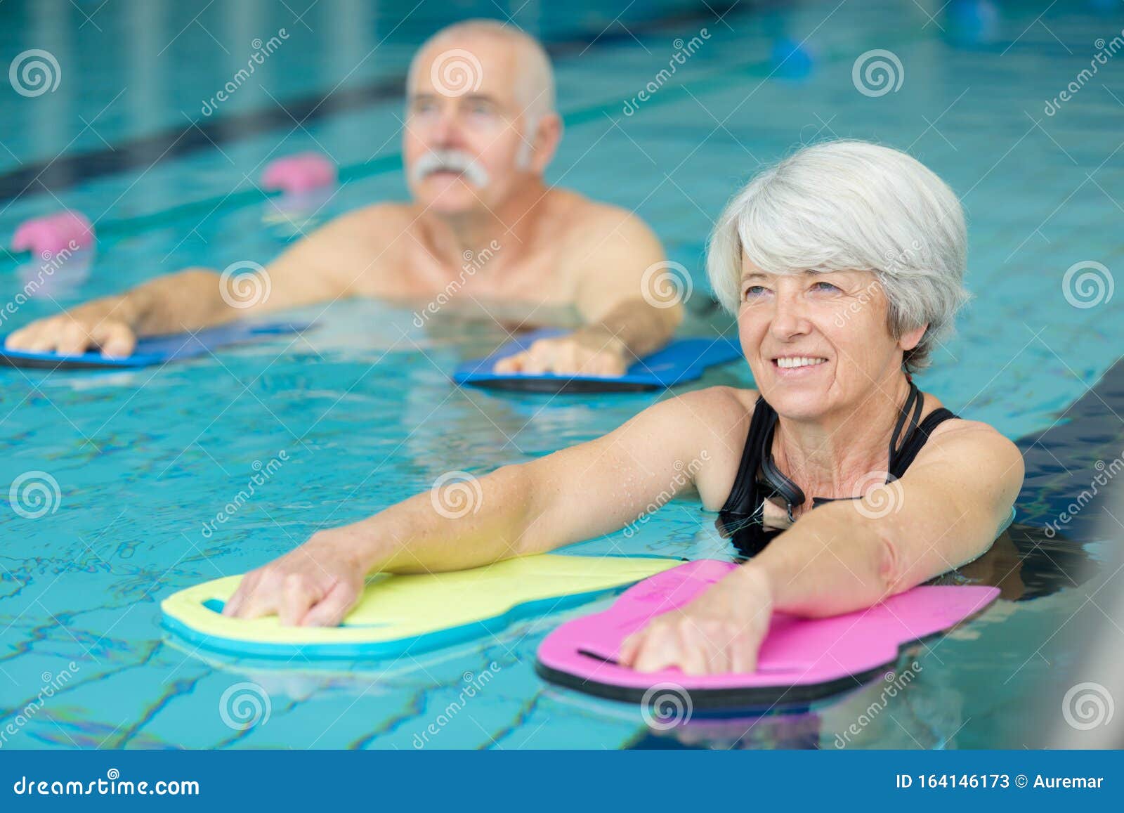 Elderly Doing Aqua Exercises in Pool Stock Image Image of male