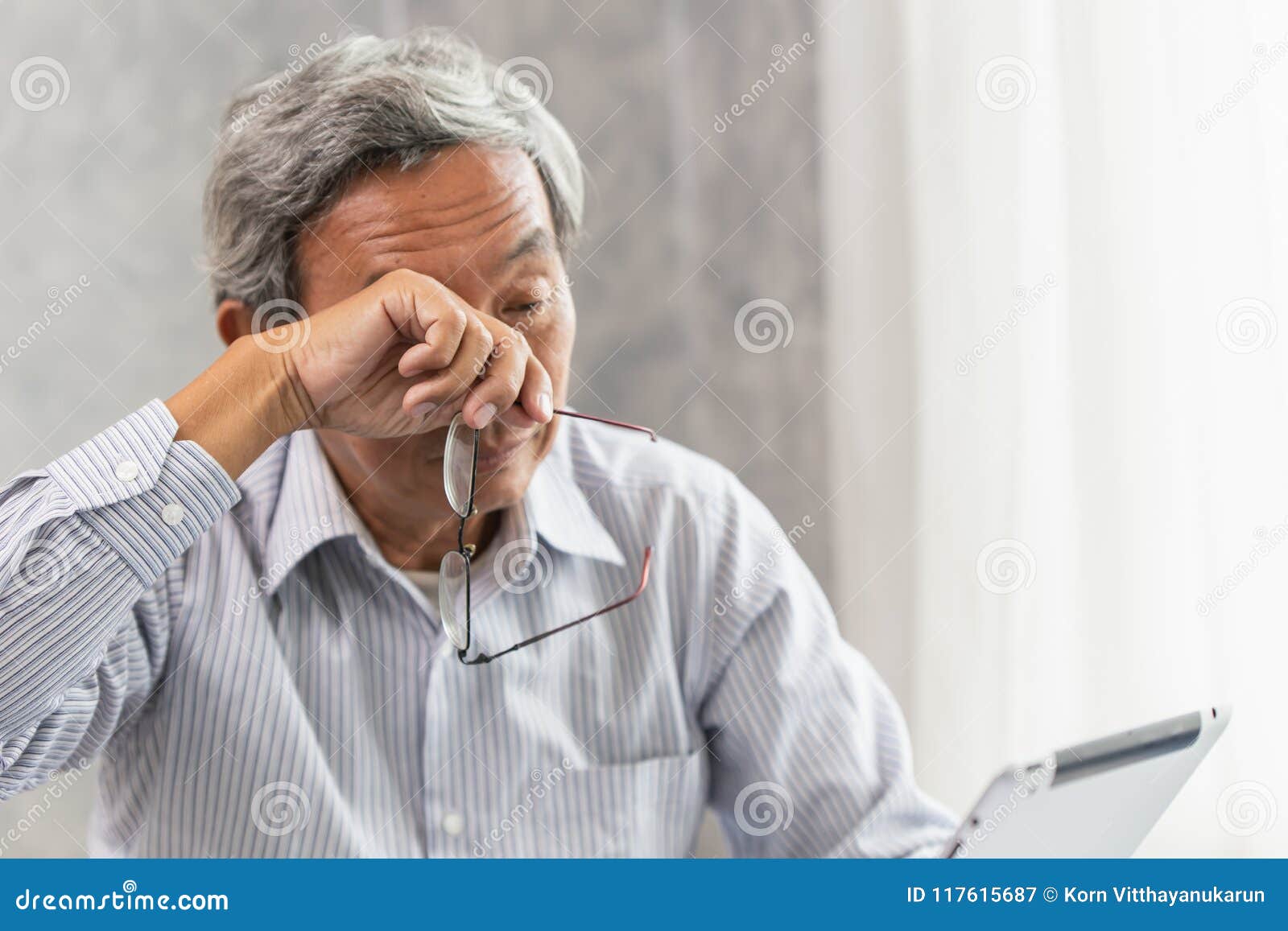 Elderly Eye Irritation Problem Fatigue and Tired from Hard Work or