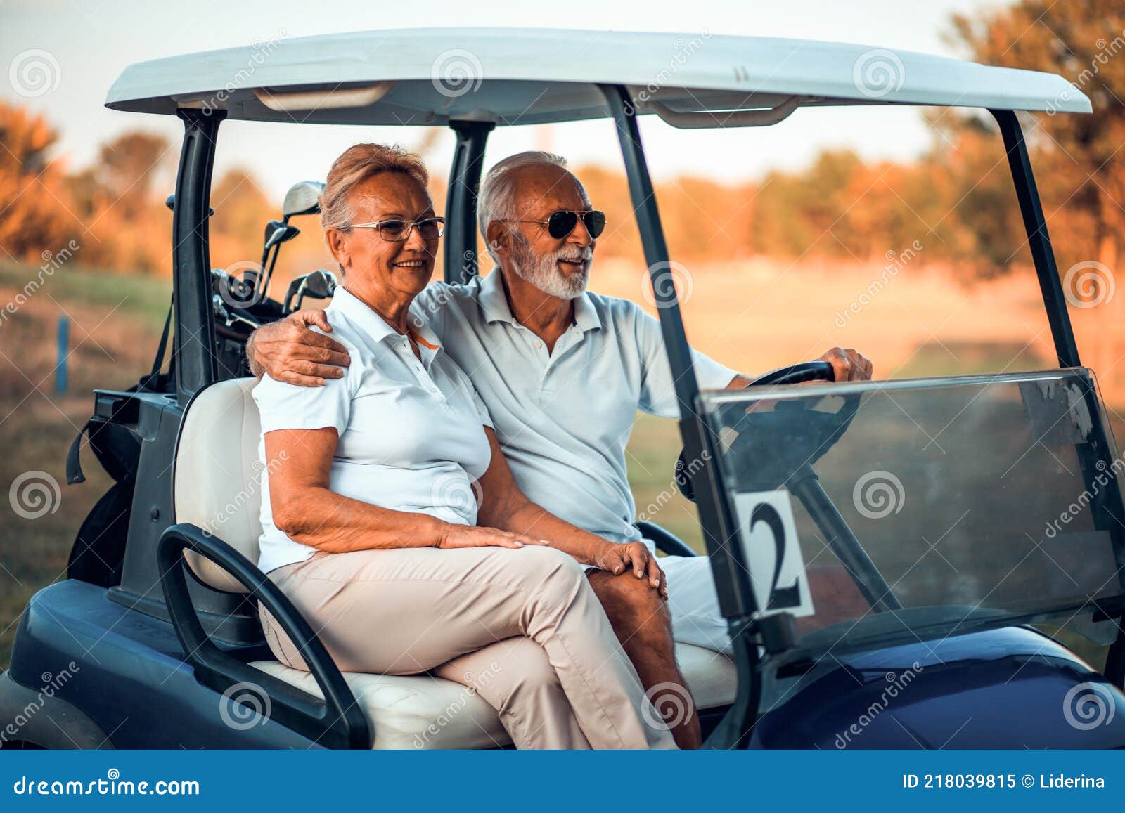 Elderly Golf Couple Rides in a Golf Cart Stock Image Image of athlete