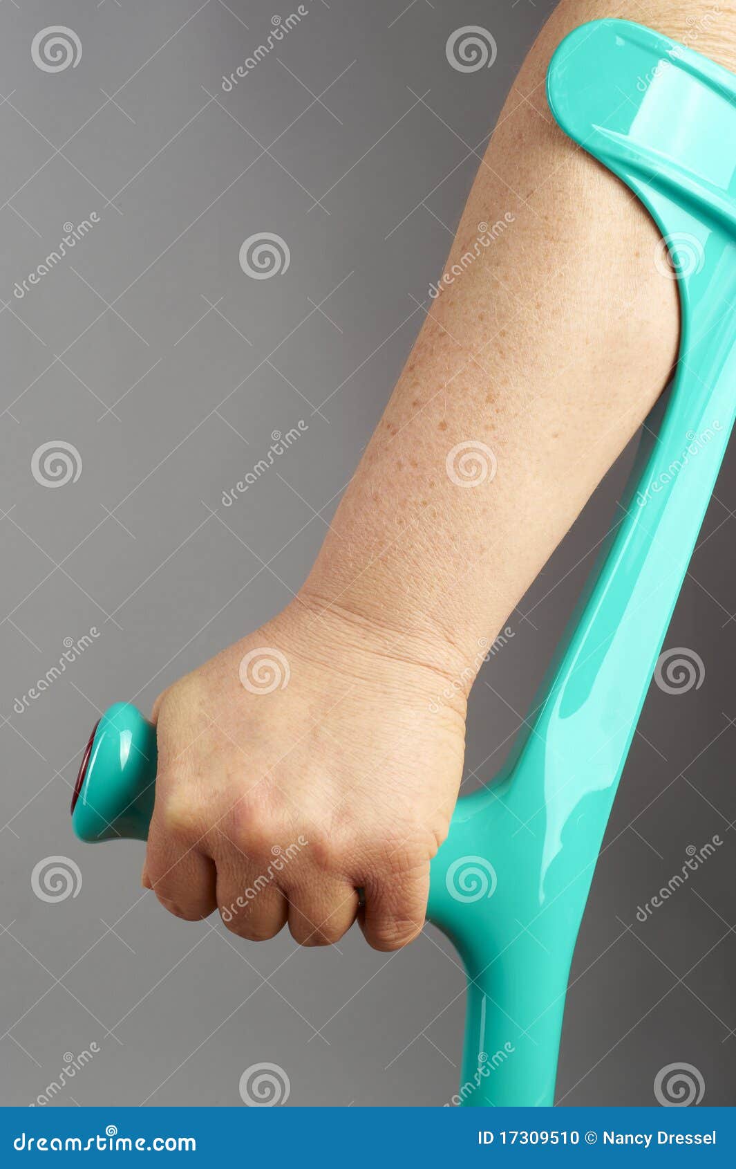 Elderly hand on crutch stock photo. Image of axillary 17309510