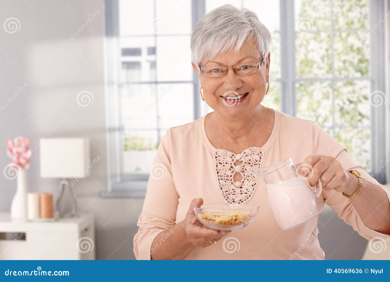 Elderly Lady Preparing Breakfast Cereal Stock Photo Image of face