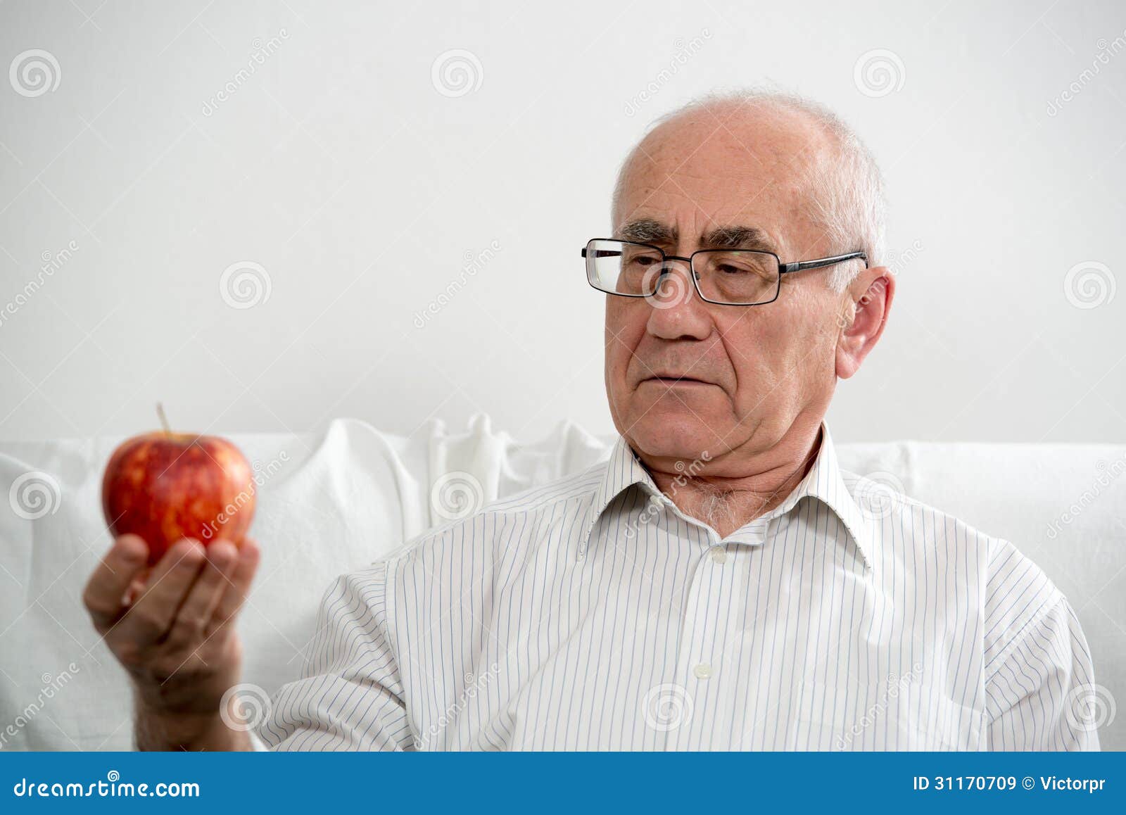Elderly man with apple stock image. Image of elderly 31170709