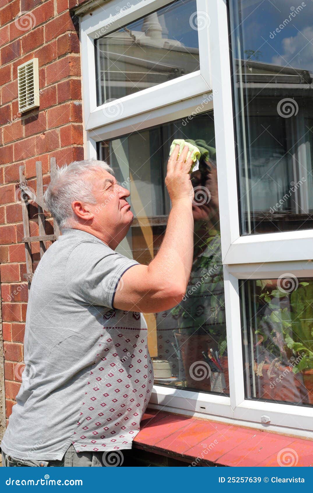 Premium Photo  Man washing and cleaning window at home housework