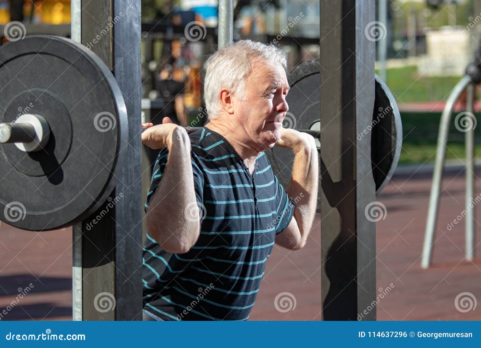 Elderly Man Lifting Weights In Outdoors Gym Stock Photo Image Of Oute elderly-man-lifting-weights-in-outdoors-gym-stock-photo-image-of-oute