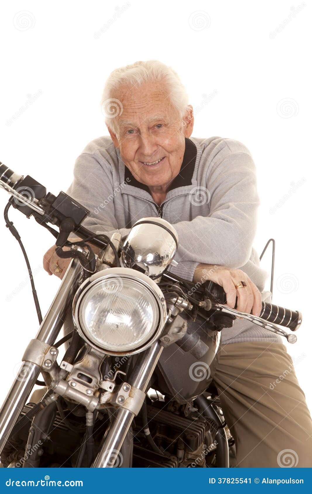 elderly-man-motorcycle-close-smile-37825541.jpg