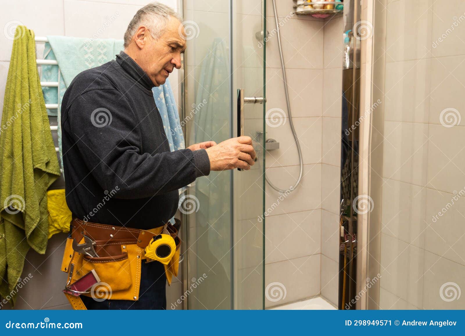 An Elderly Man is Repairing a Shower Cabin Stock Image Image of
