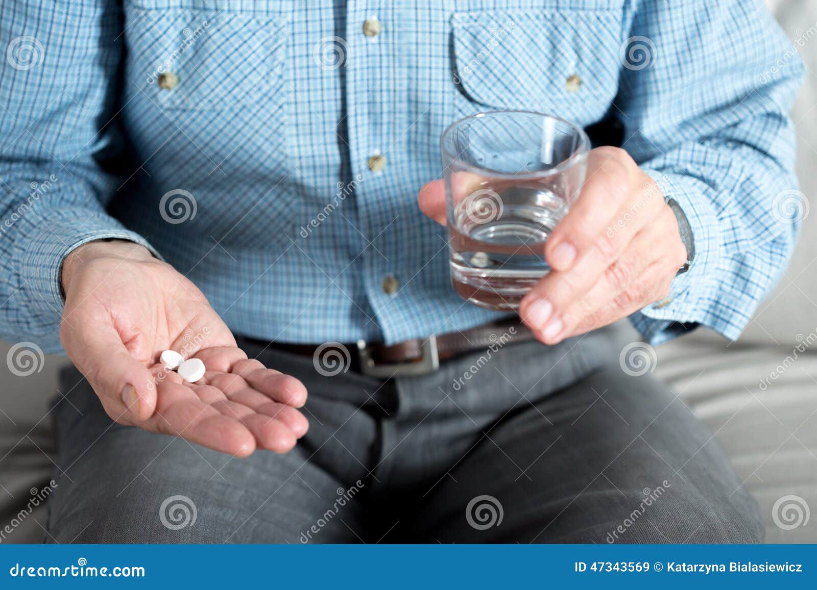 elderly man taking medicament