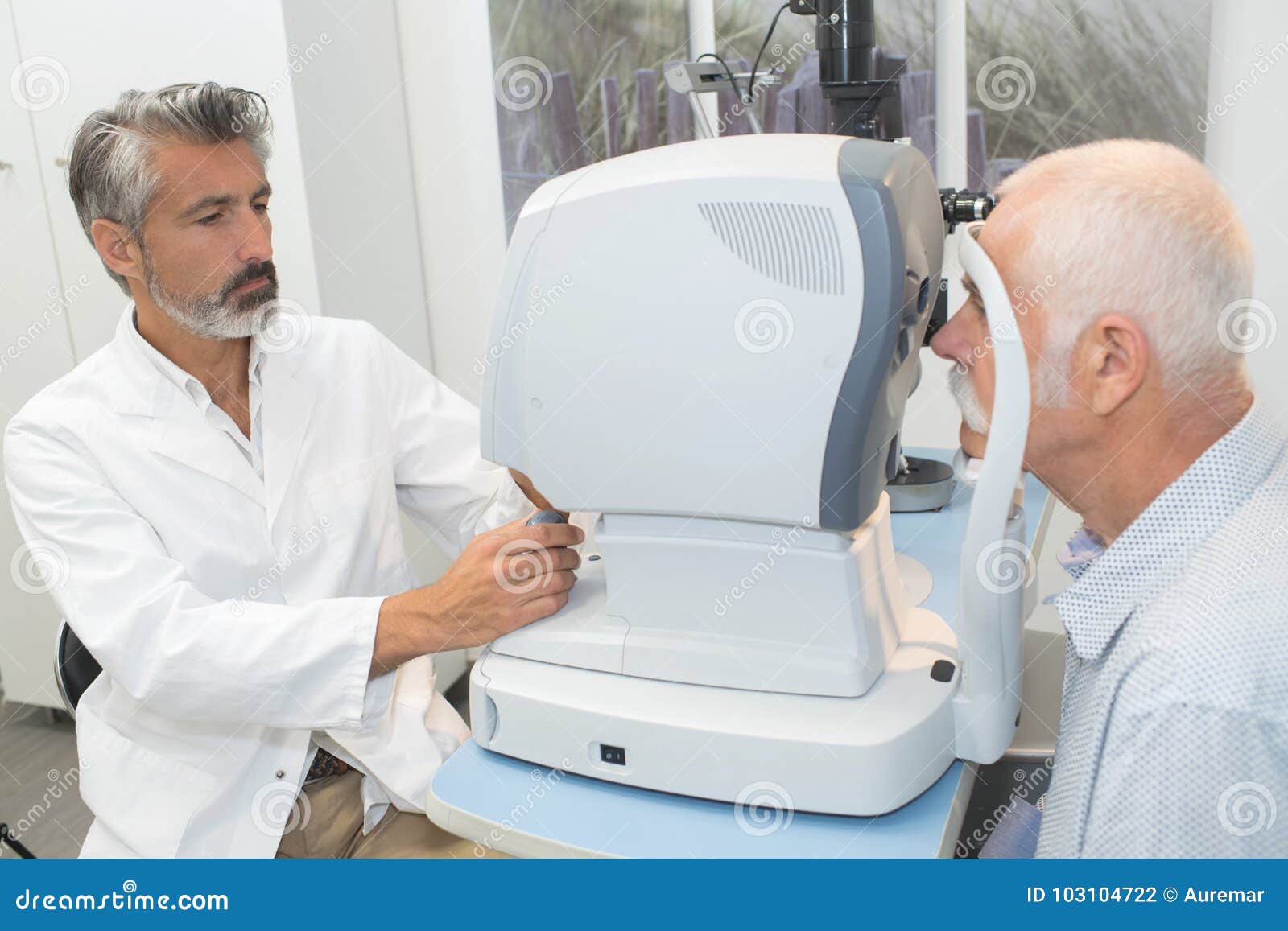 elderly man with glaucoma at optician for optical examination