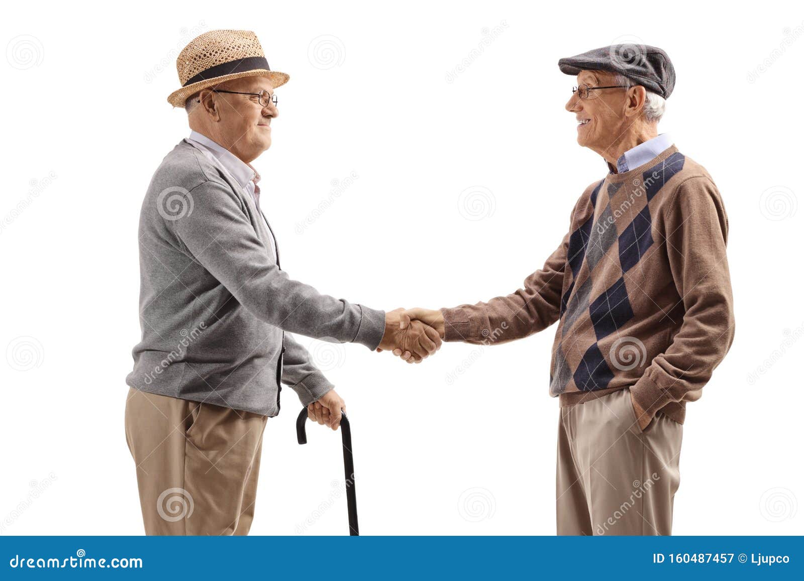 Elderly men shaking hands stock image. Image of caucasian 160487457