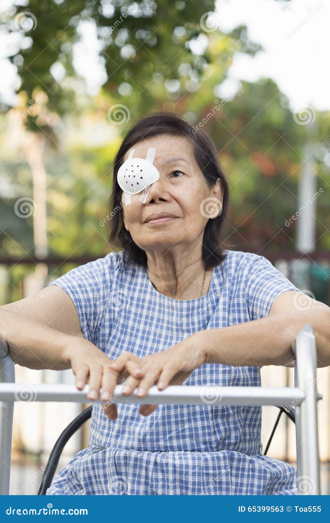 Elderly Use Eye Shield Covering after Cataract Surgery. Stock Image