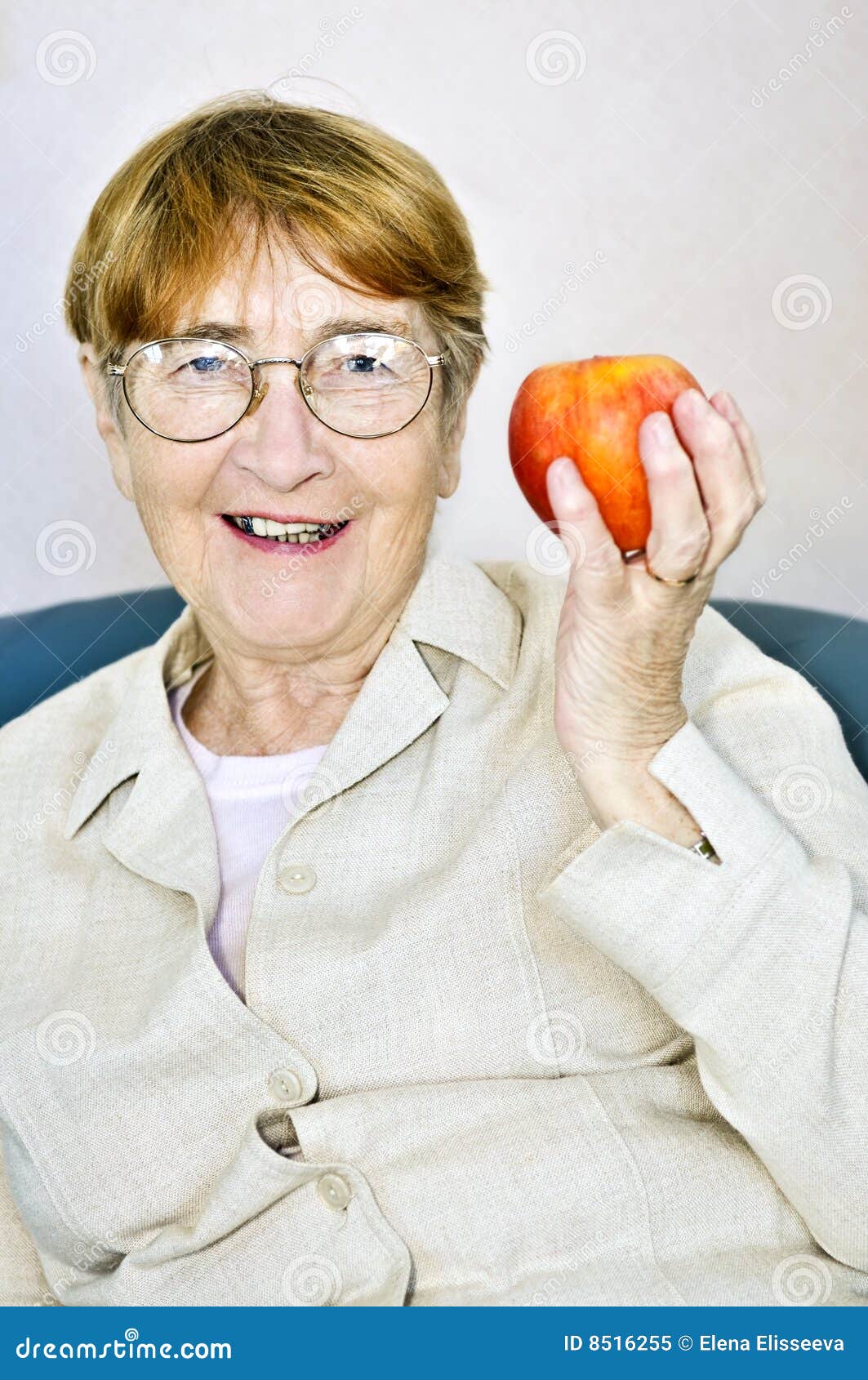 Elderly woman with apple stock image. Image of fruit, care 8516255