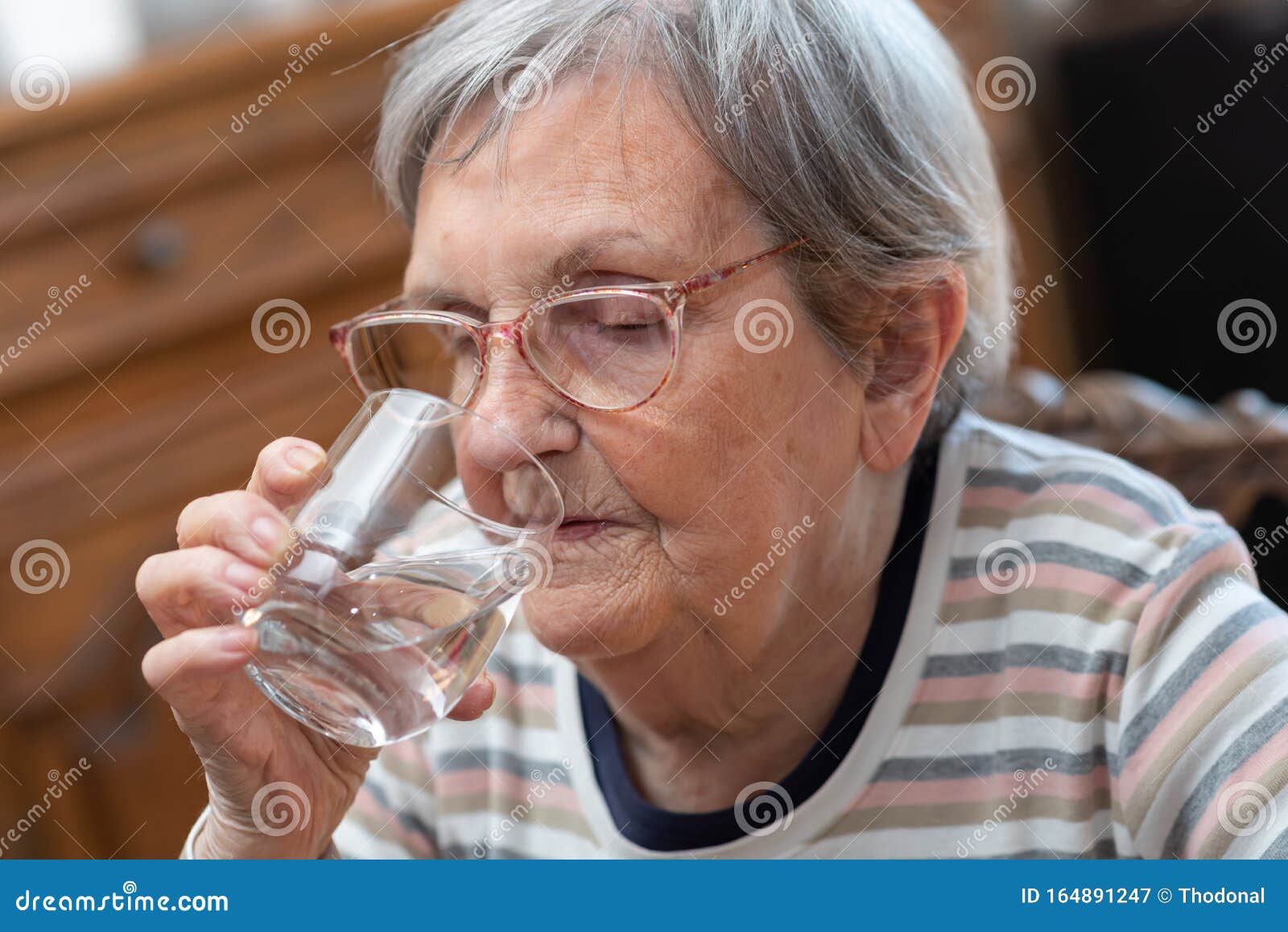 Elderly Woman Drinking Water Stock Image Image of caucasian