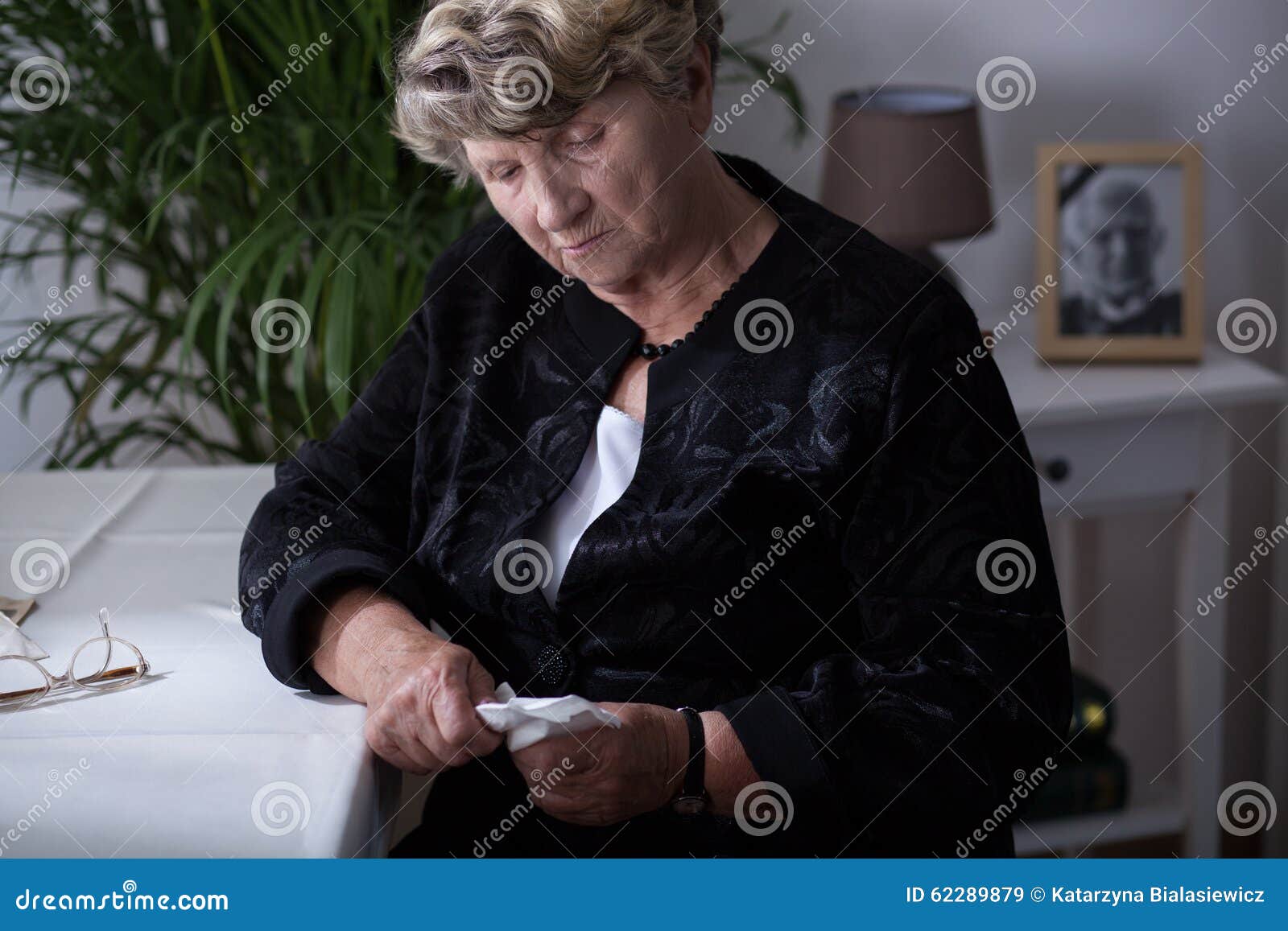 elderly woman with handkerchief