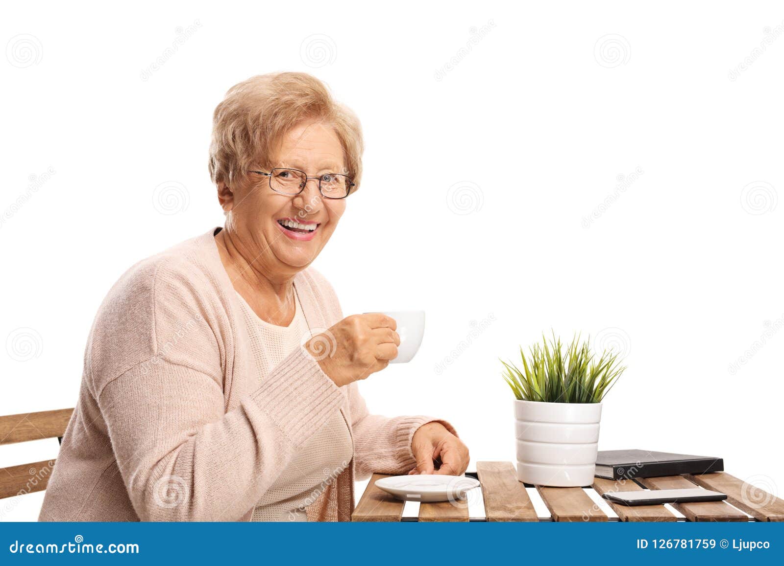 Elderly Woman Sitting at a Table Drinking Coffee Stock Image Image of