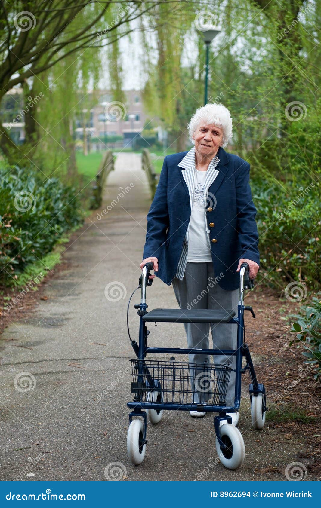 Elderly woman with walker stock photo. Image of aged, lane 8962694