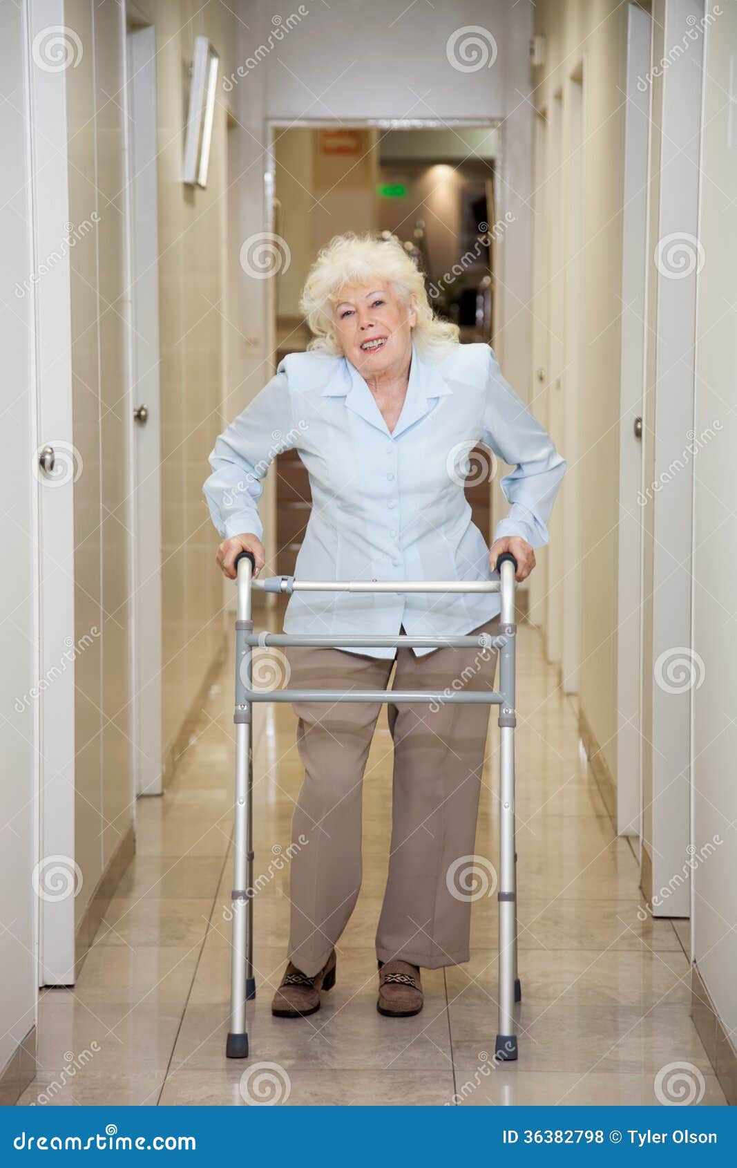 Elderly Woman With Walker In Hospital Corridor Royalty ...